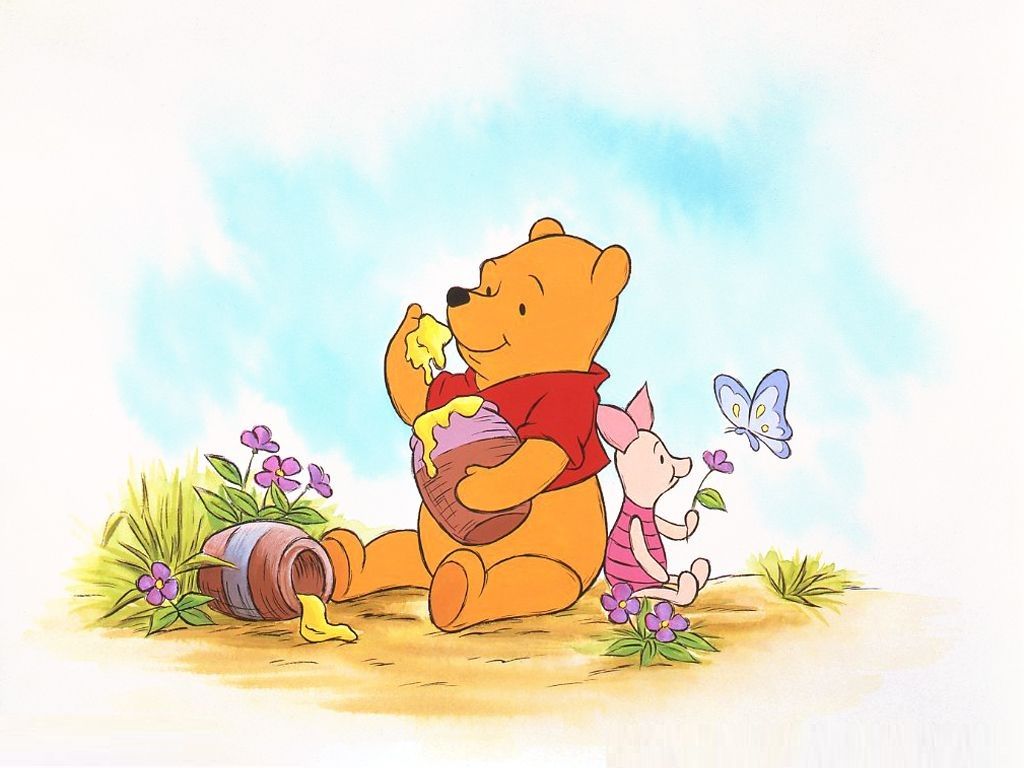 A winnie the pooh character sitting in front of flowers - Winnie the Pooh