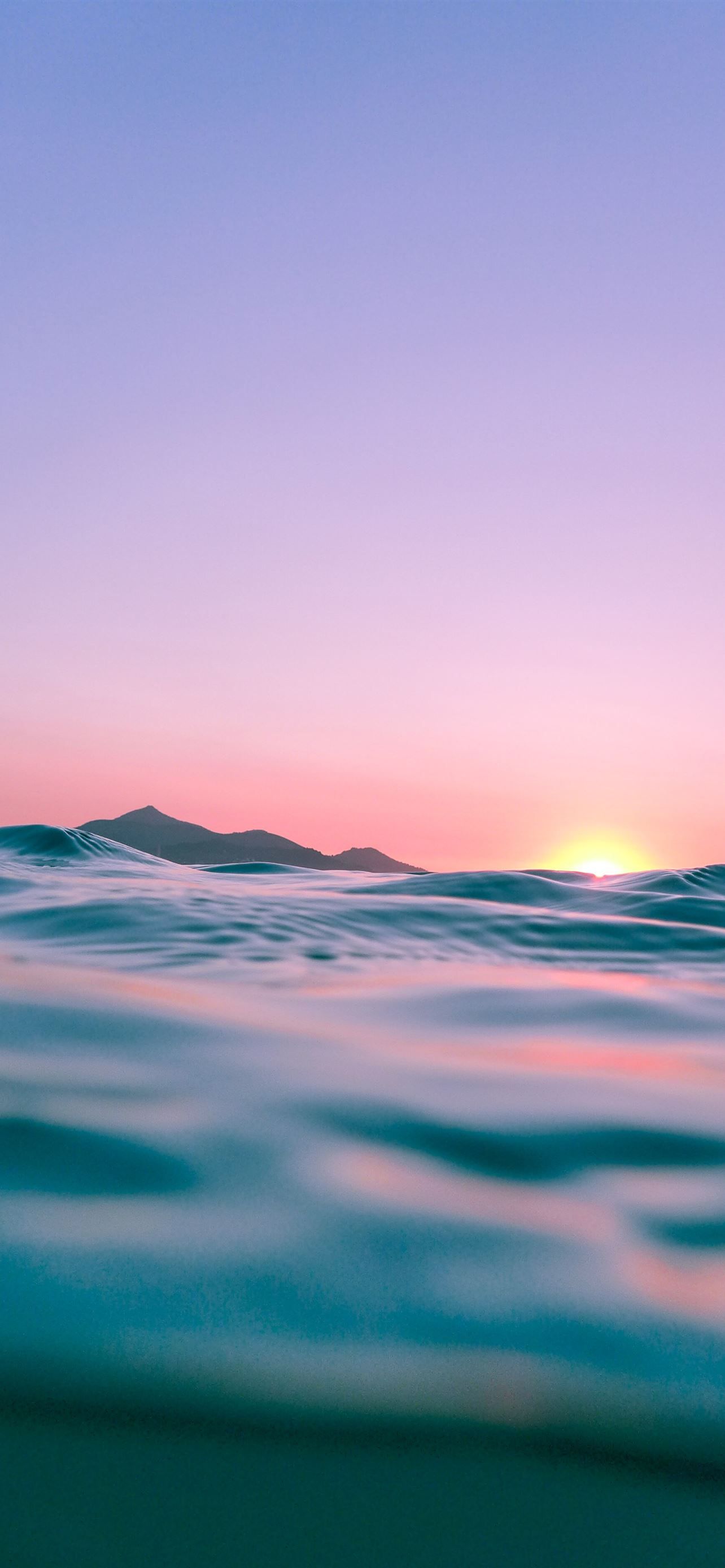 A sunset over the ocean with waves - Ocean, water