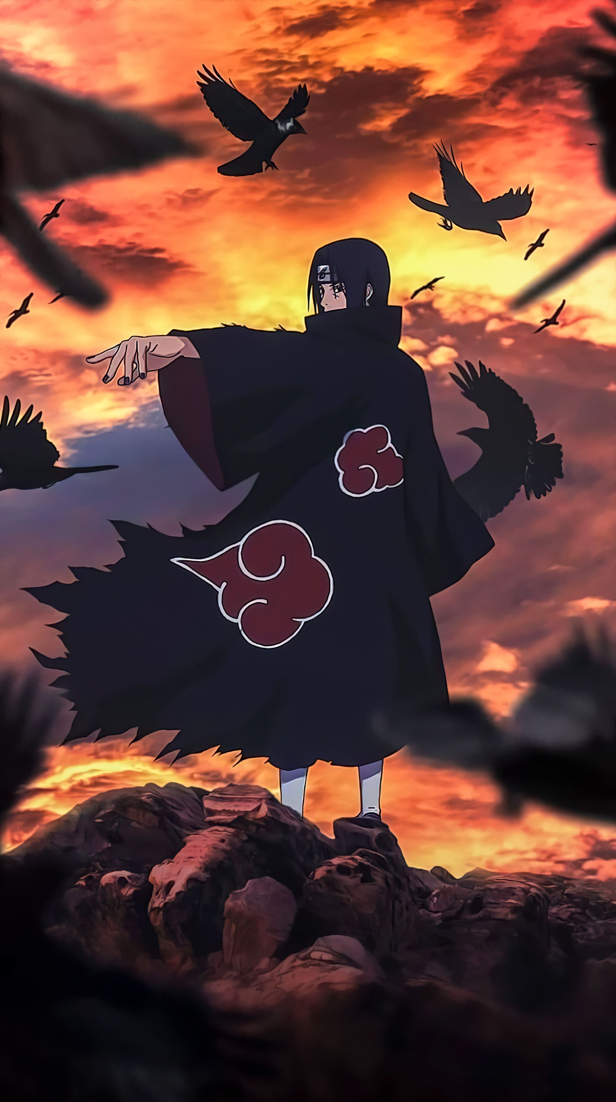 A man with black hair and an orange sunset - Itachi Uchiha