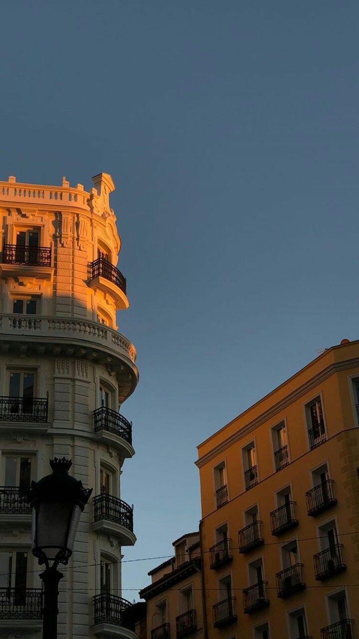 A tall building with balconies and windows - Architecture