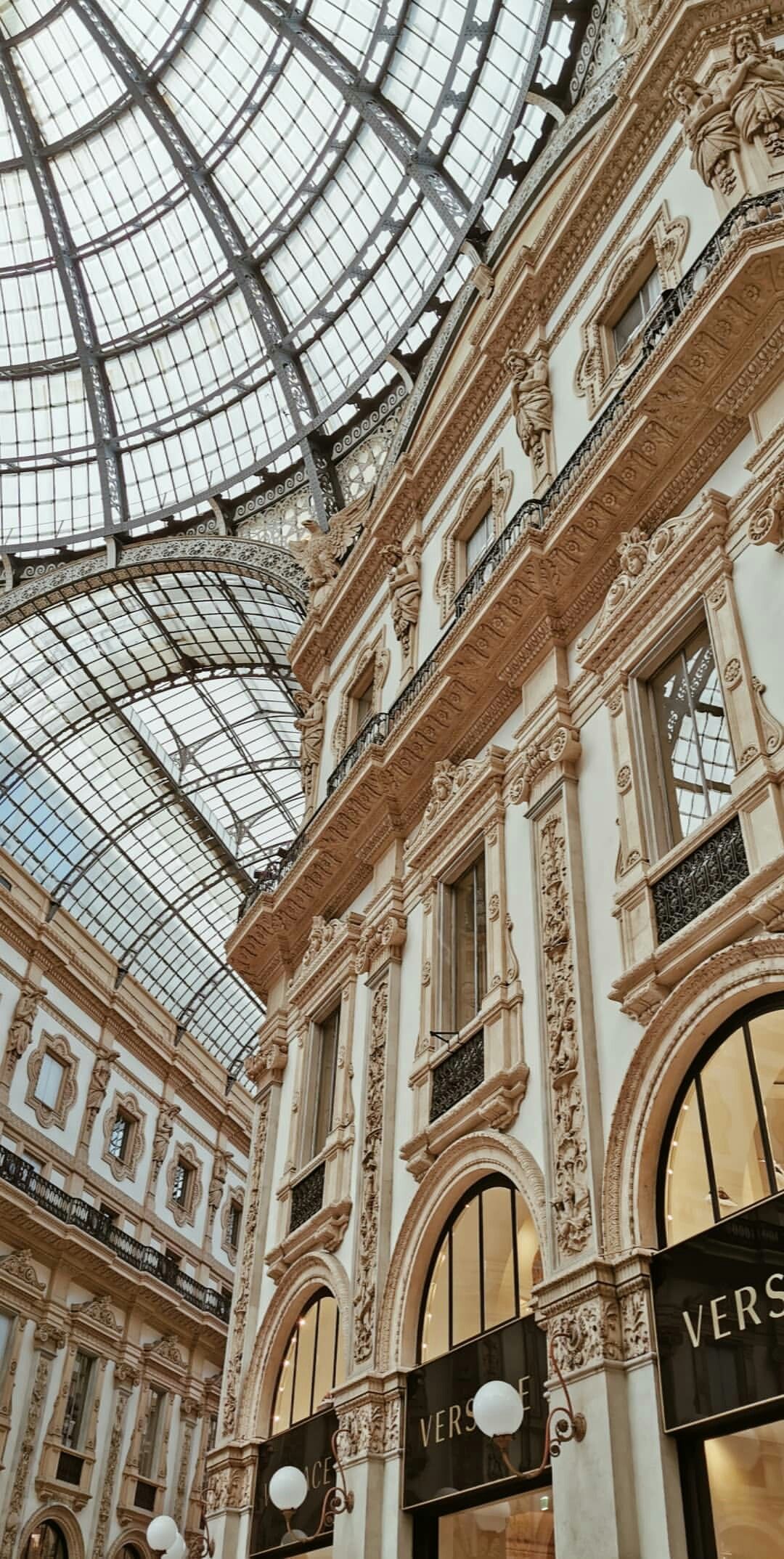 The inside of a building with a glass ceiling - Architecture