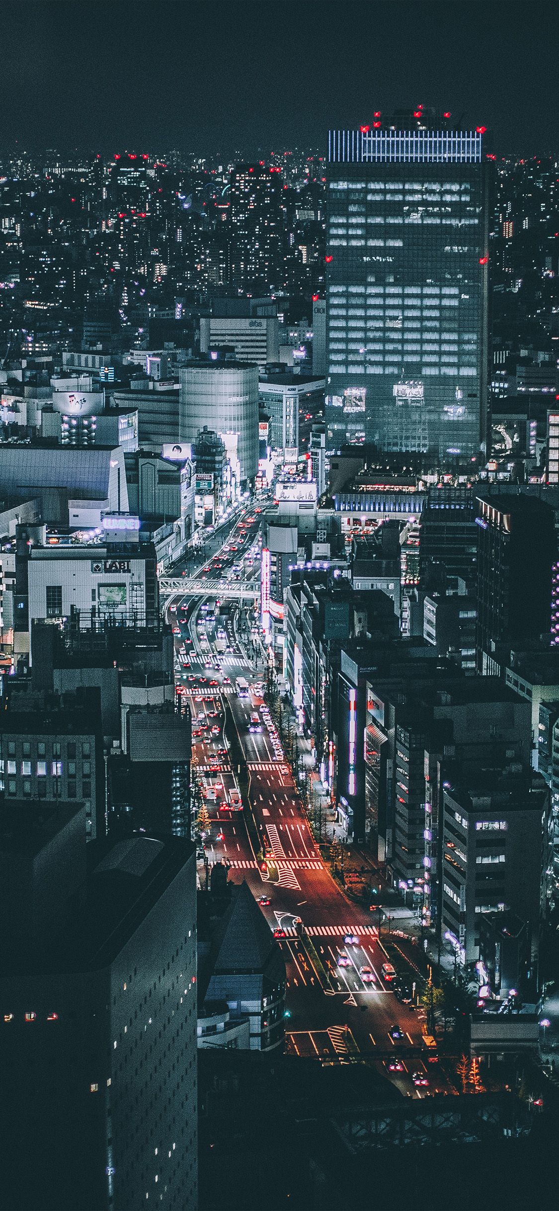 A city at night with the lights on - Anime city, architecture