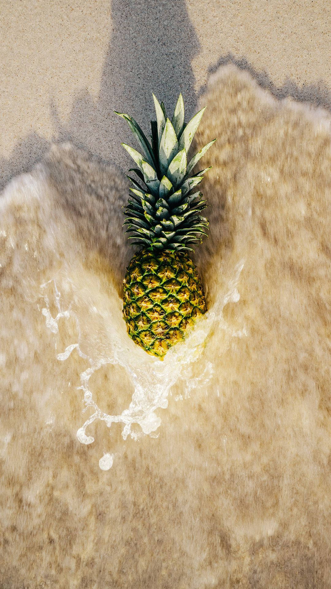 Download Pineapple In Beach Waves Wallpaper