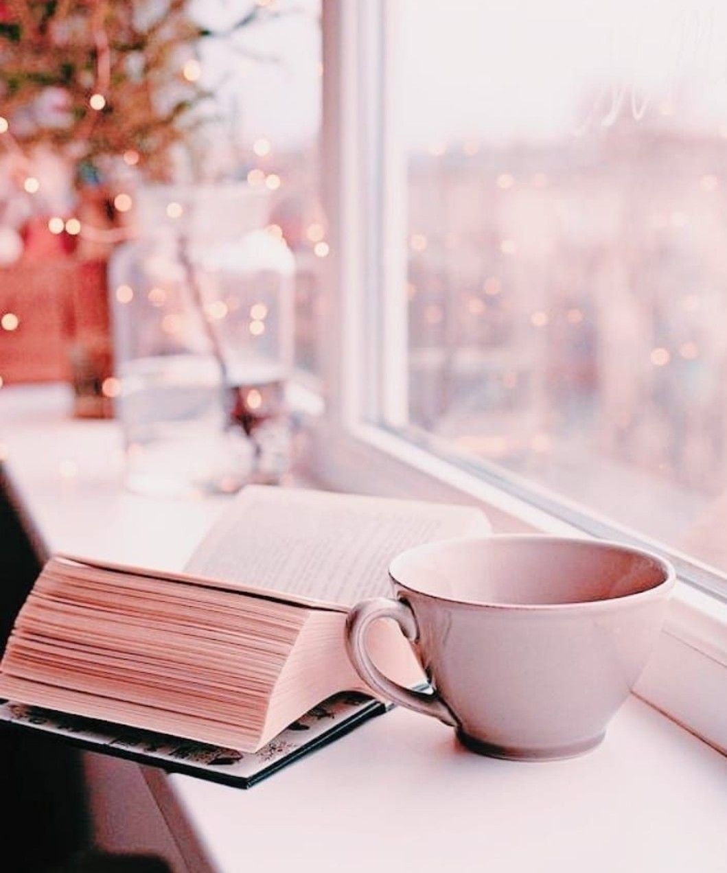 A cup of coffee and an open book on the window sill - Coffee