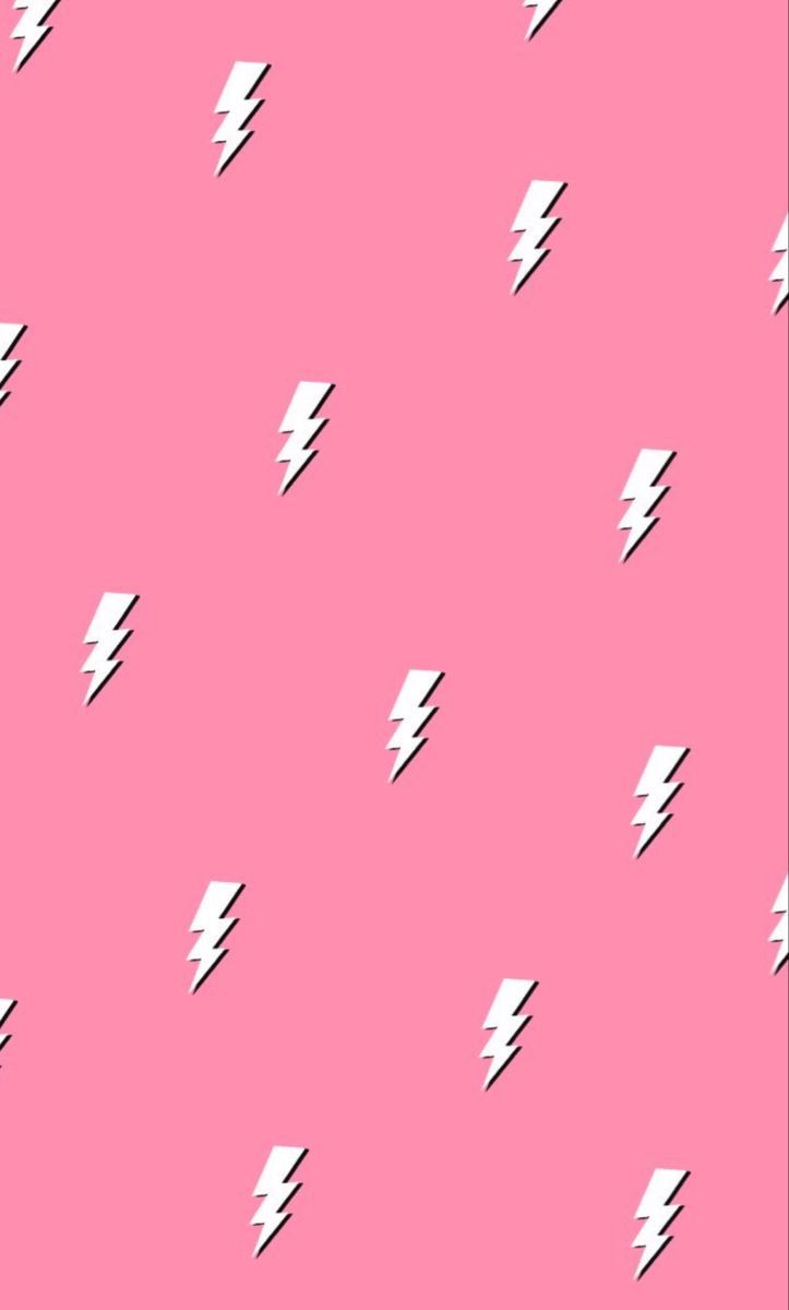 A pink background with white lightning bolts - VSCO