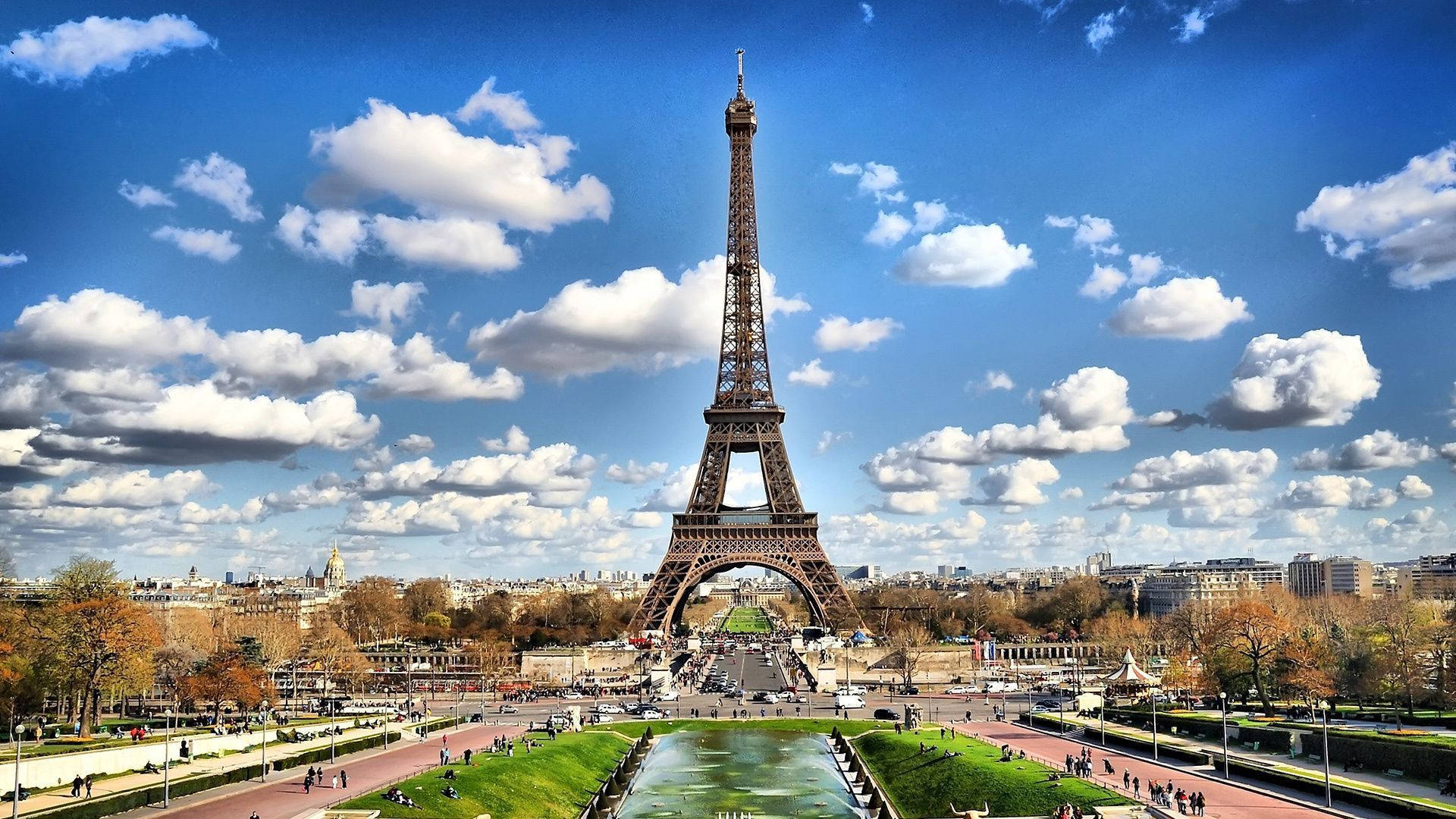 The Eiffel Tower is a wrought iron lattice tower on the Champ de Mars in Paris, France. It is named after the engineer Gustave Eiffel, whose company designed and built the tower. - Paris