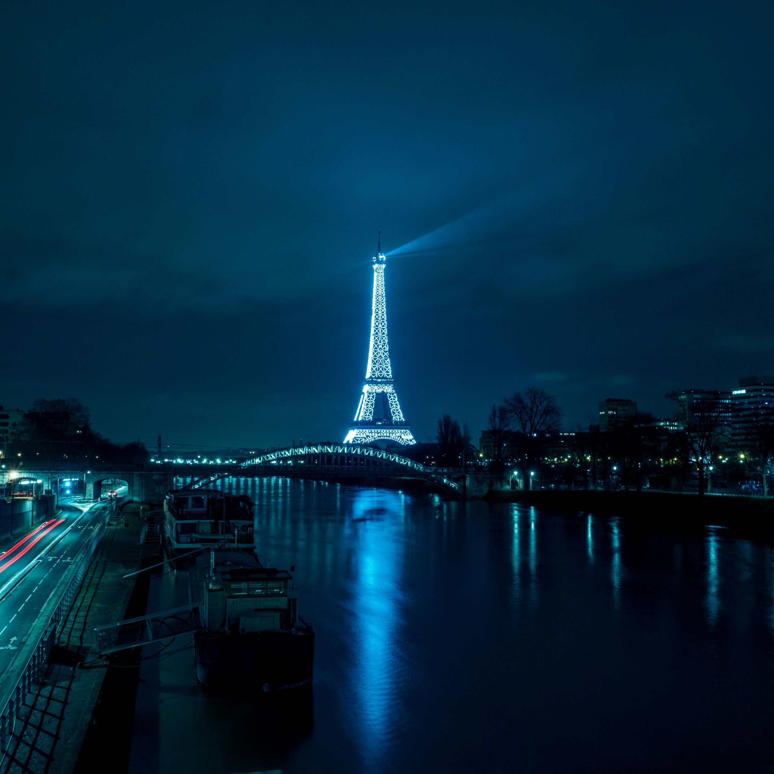 A city at night with the eiffel tower in it - Paris