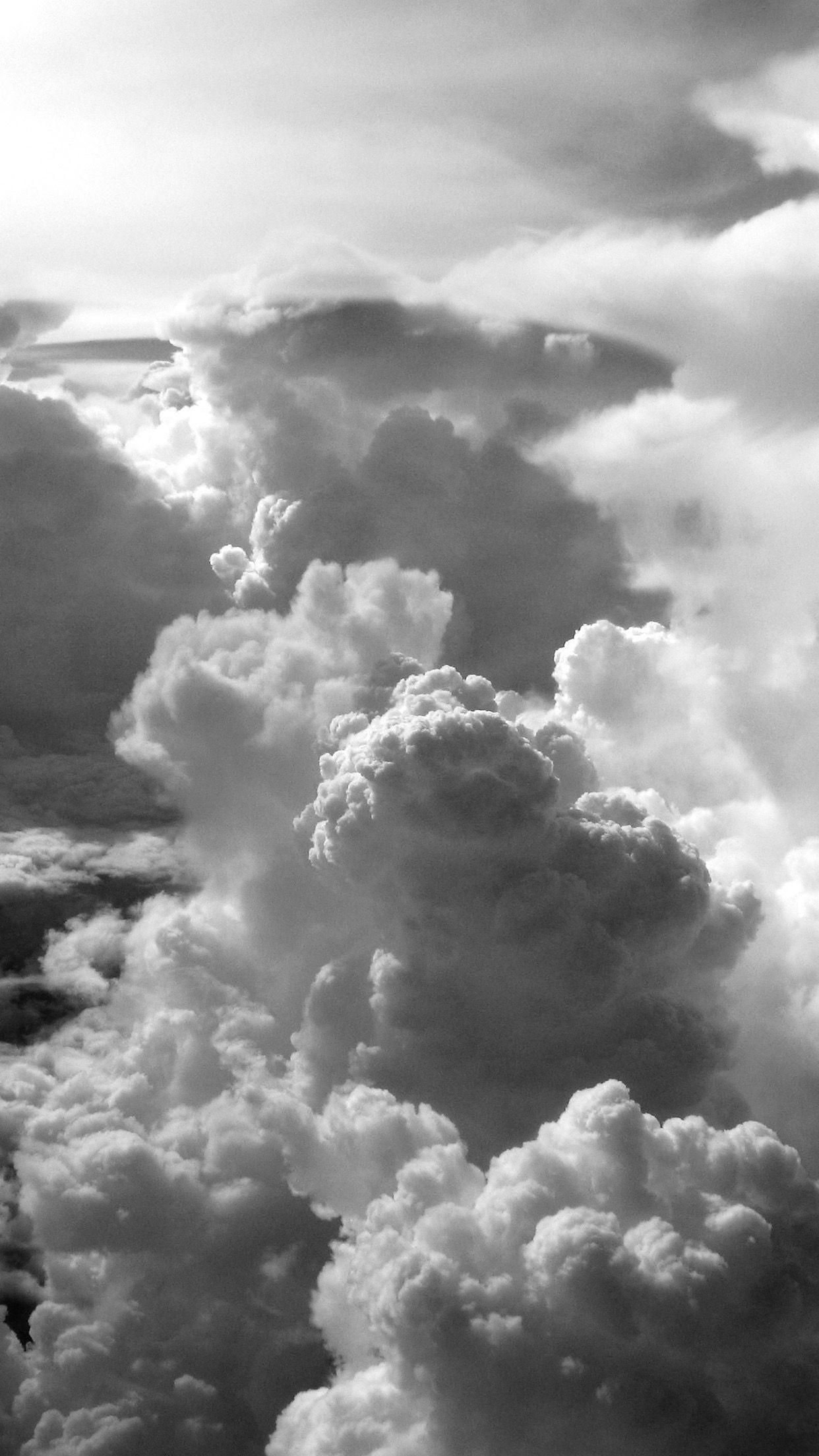 A black and white photo of clouds - Gray