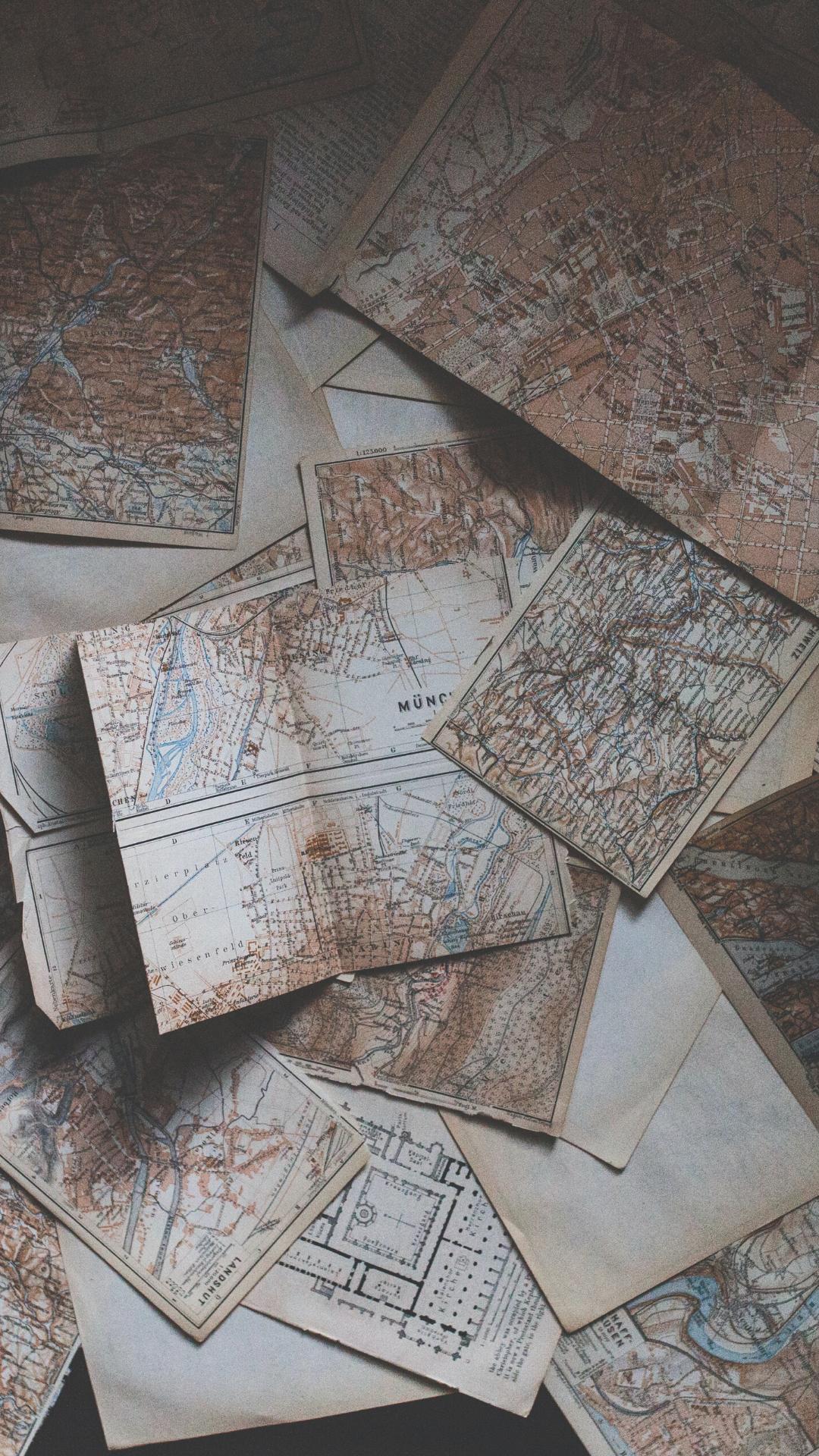 A pile of old maps on top - Dark academia, silver