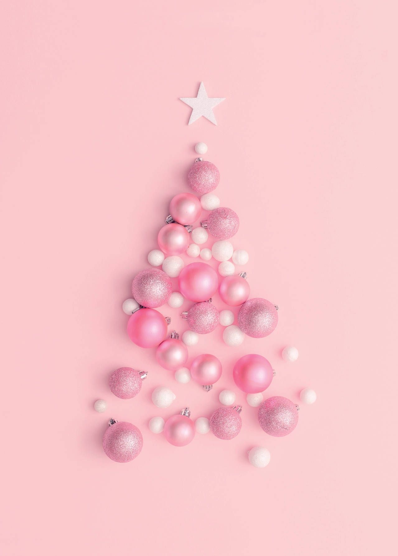 A christmas tree made out of pink balls - Christmas