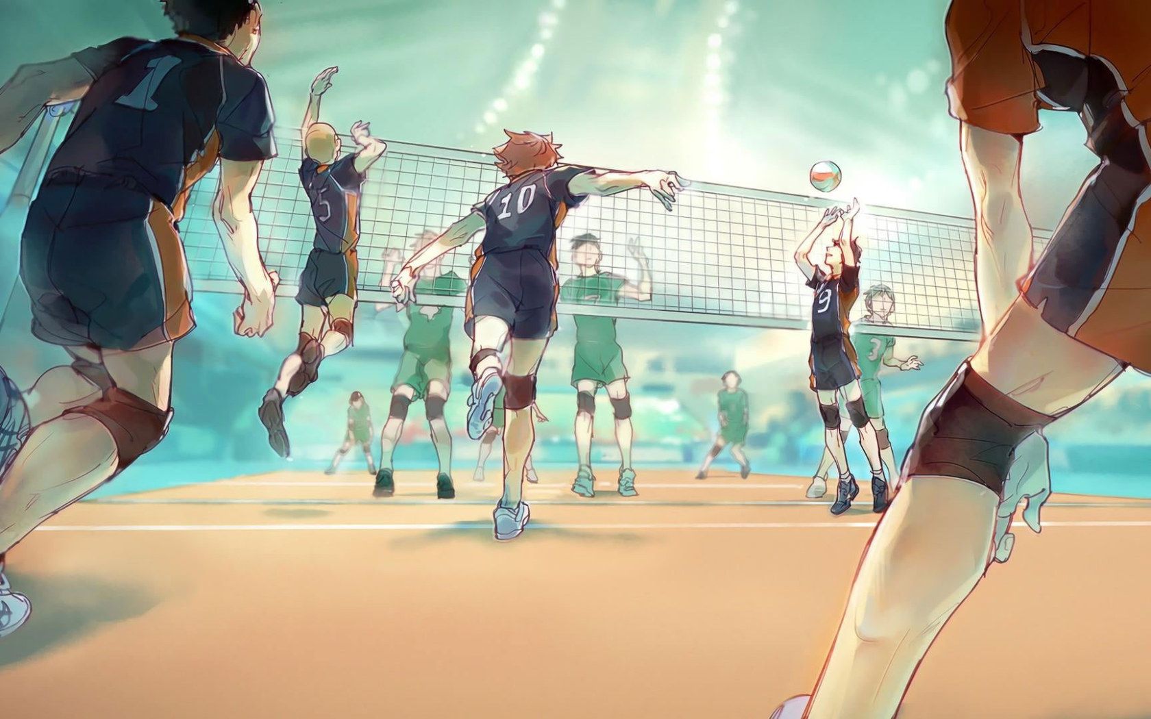 A group of people playing volleyball on the court - Volleyball