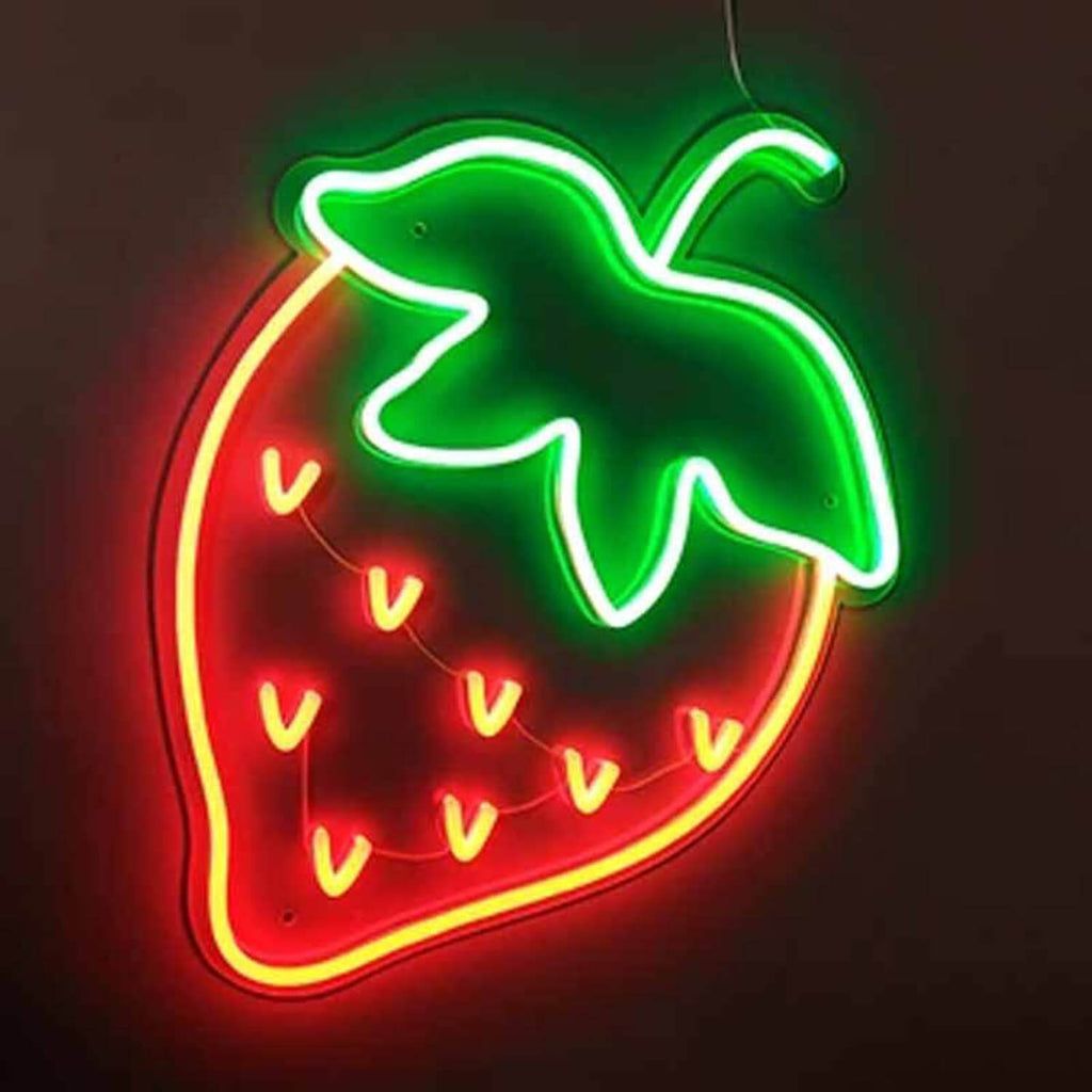 A neon sign of a strawberry. - Neon orange