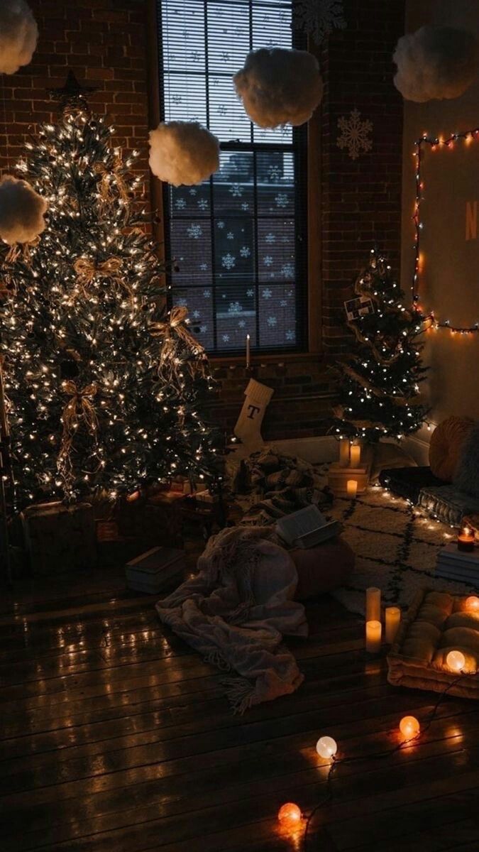 A room with christmas decorations and candles - Christmas iPhone, Christmas, cozy, Christmas lights
