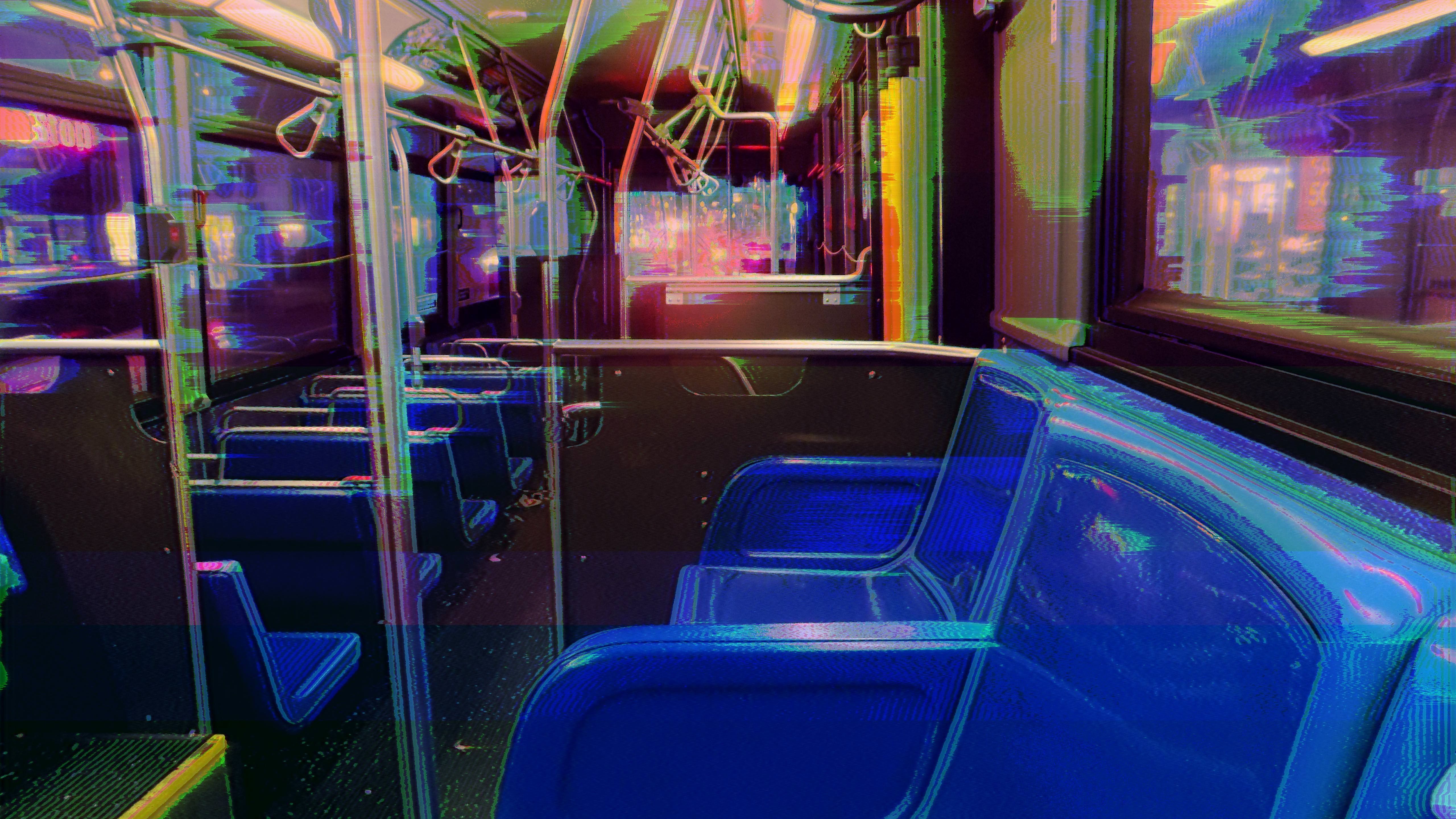 A bus with blue seats and windows - Glitch