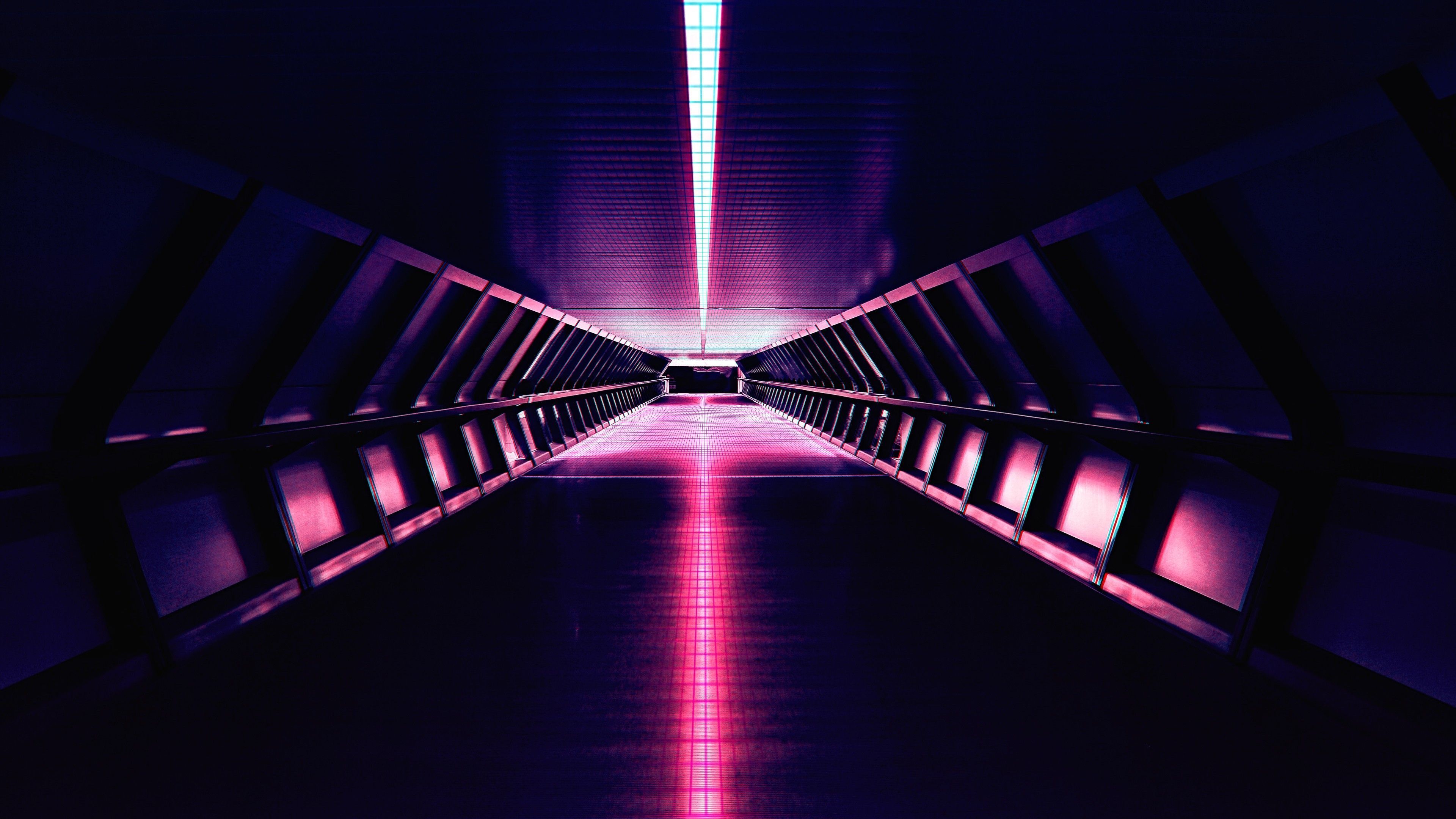 A pink and purple-lit walkway with a bright light at the end. - 3840x2160, dark vaporwave