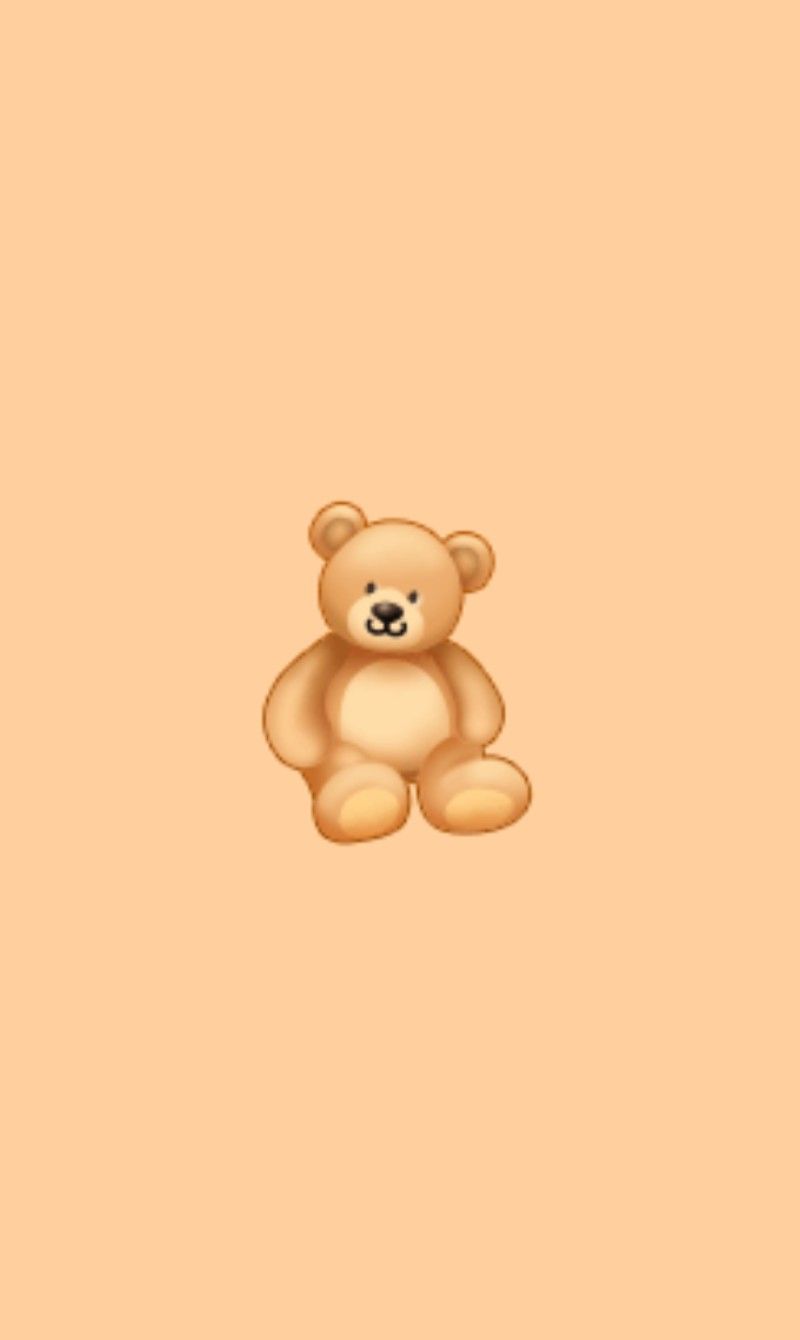 A brown teddy bear sitting on a pink background - Teddy bear