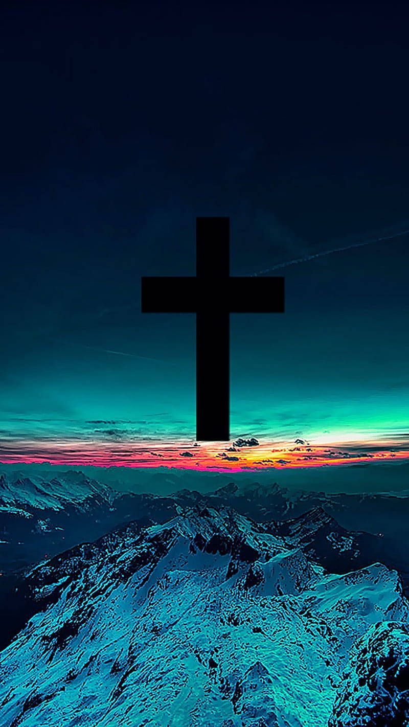 A black cross over a snowy mountain - Christian iPhone