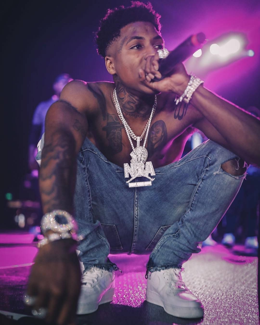 Download Nba Youngboy Neon Purple Stage Wallpaper