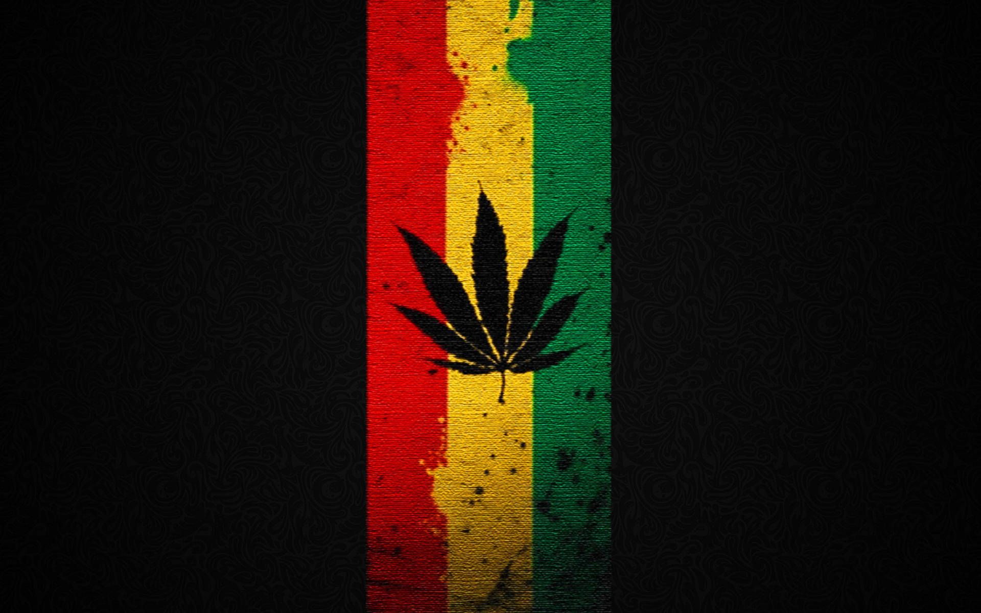 A black background with a colorful striped design of red, yellow, and green with a cannabis leaf in the center. - Weed