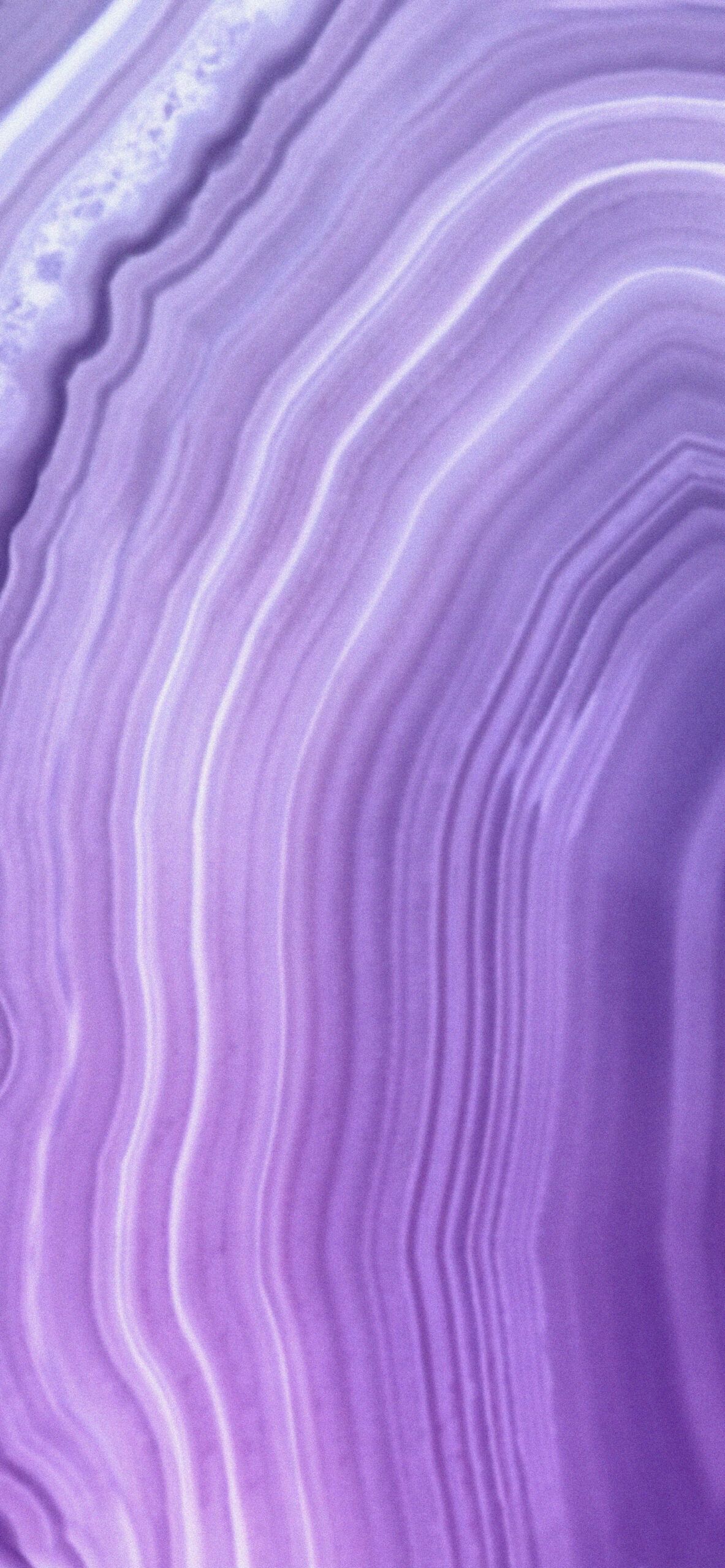 A close up of a purple and white agate stone. - Purple, pastel purple, lavender, light purple