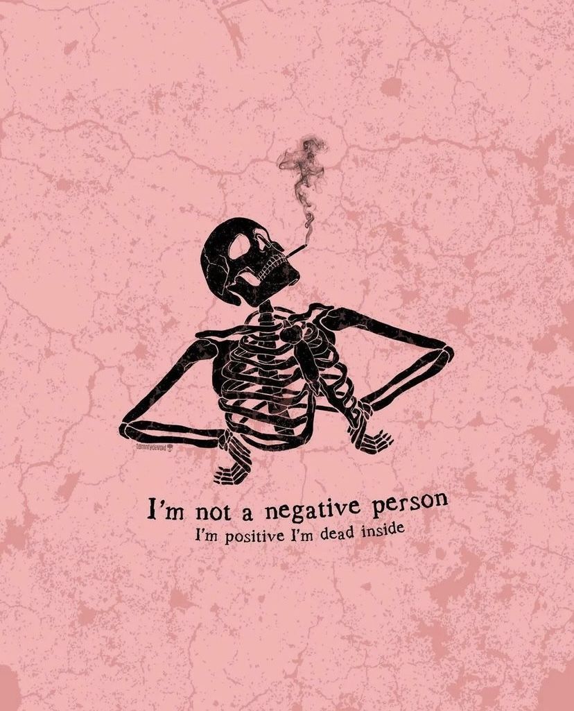 A skeleton smoking a cigarette with the caption 