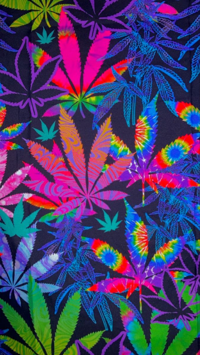 A colorful tie dye fabric with marijuana leaves - Weed