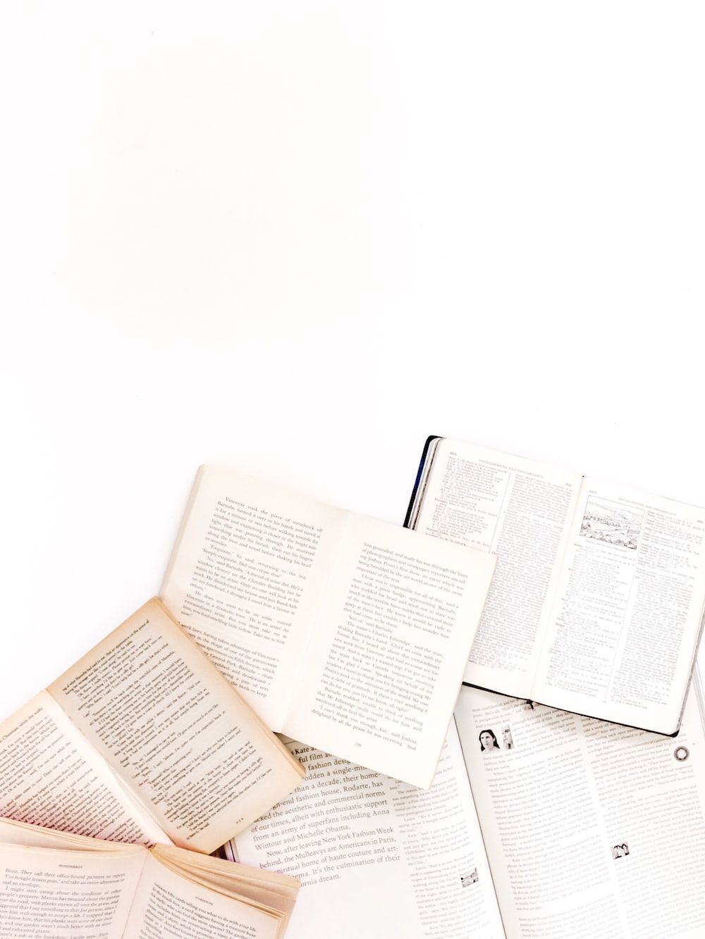 Opened books on a white background - Books