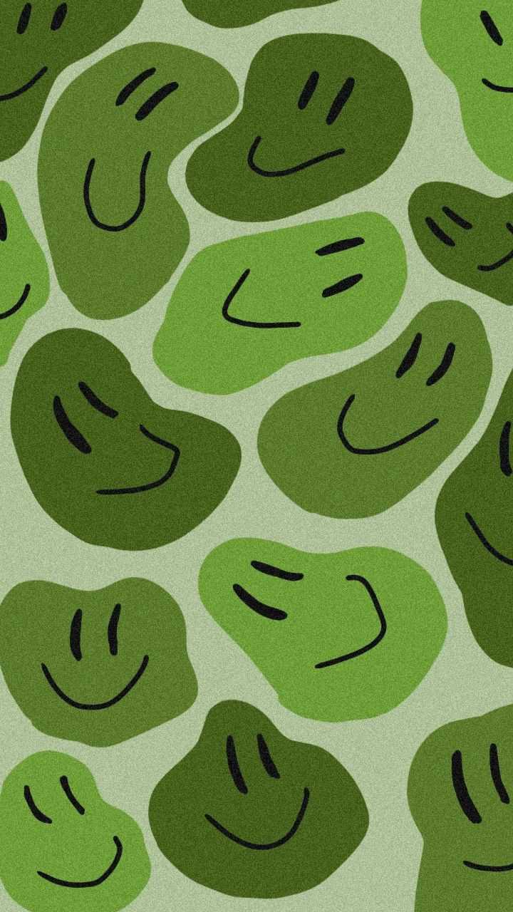 IPhone wallpaper with a pattern of smiling beans - Sage green