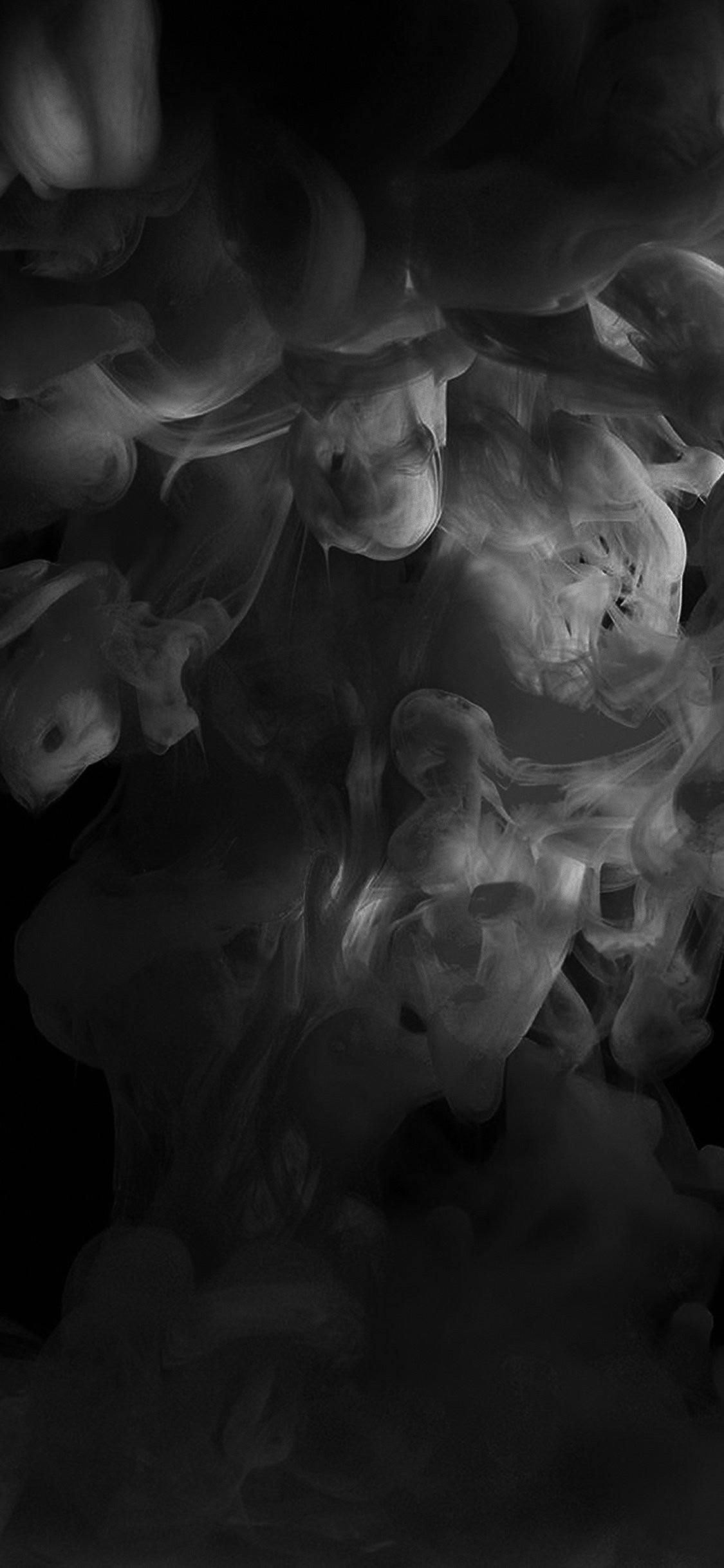 A black and white image of smoke. - Smoke