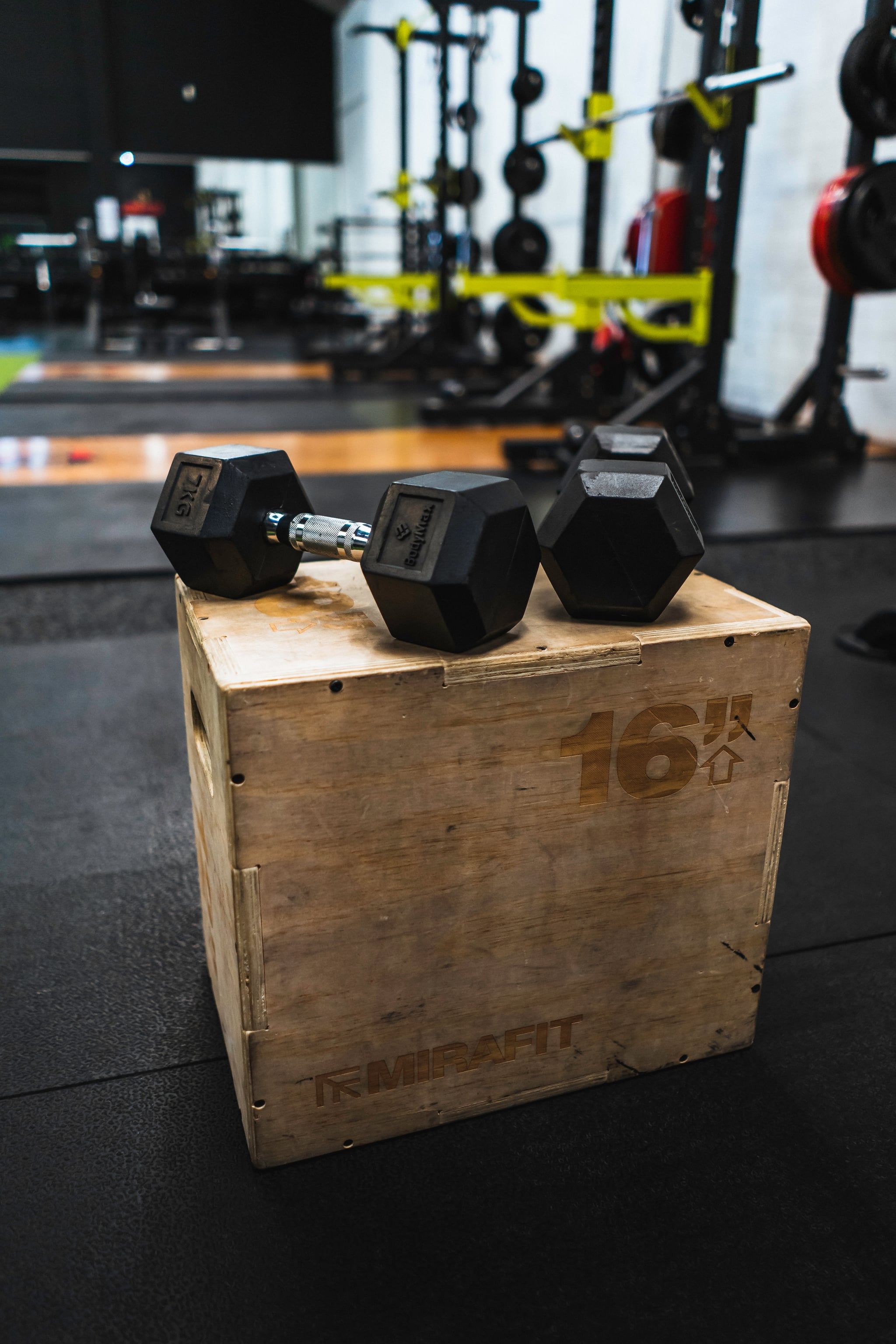 A box with dumbbells on it in the gym - Gym