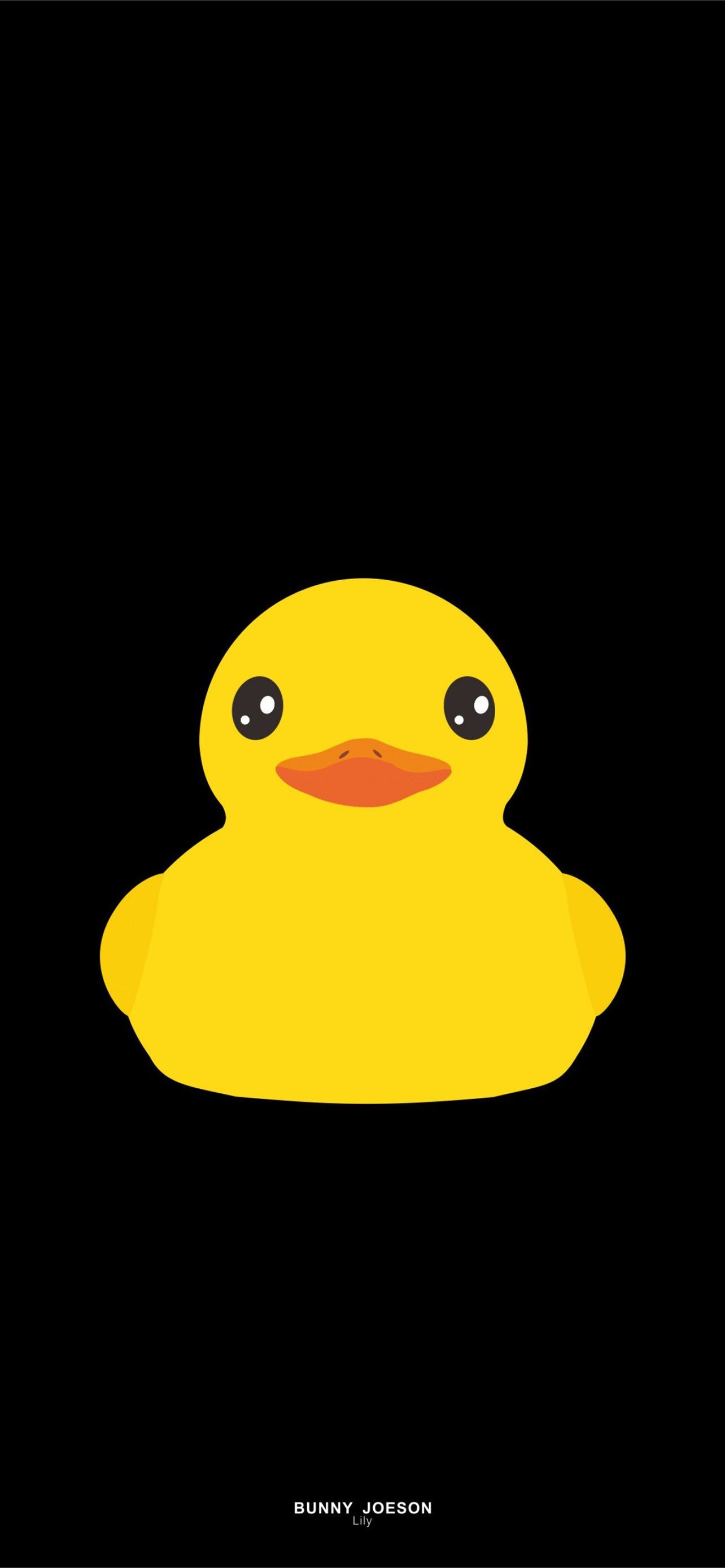A yellow duck with black background and white eyes - Duck