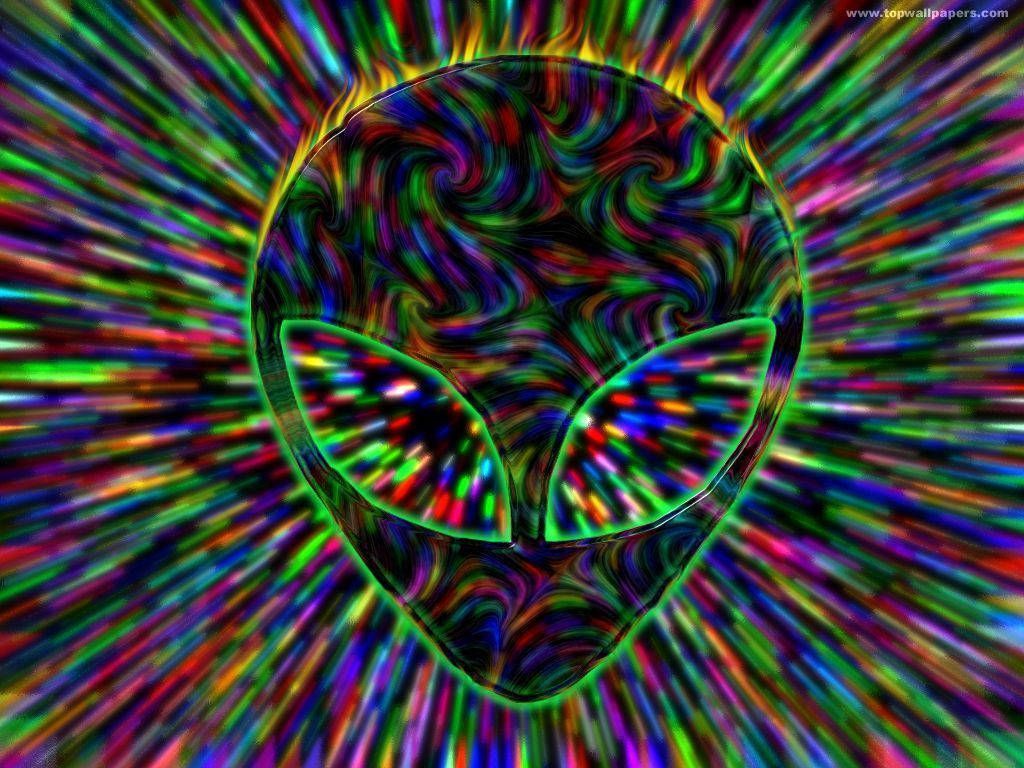 A colorful alien head with rays coming out of it - Alien