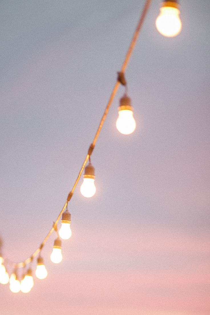 A string of lights hanging from the sky - Wedding