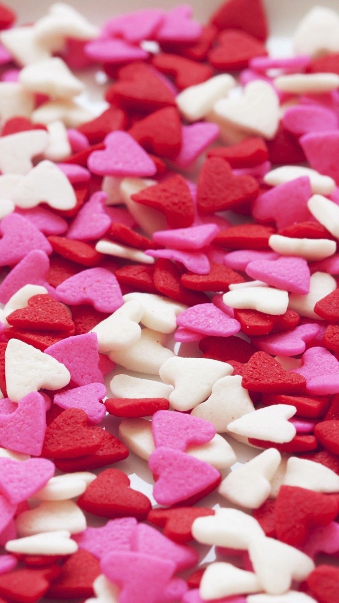 A close up of some hearts on the table - Candy