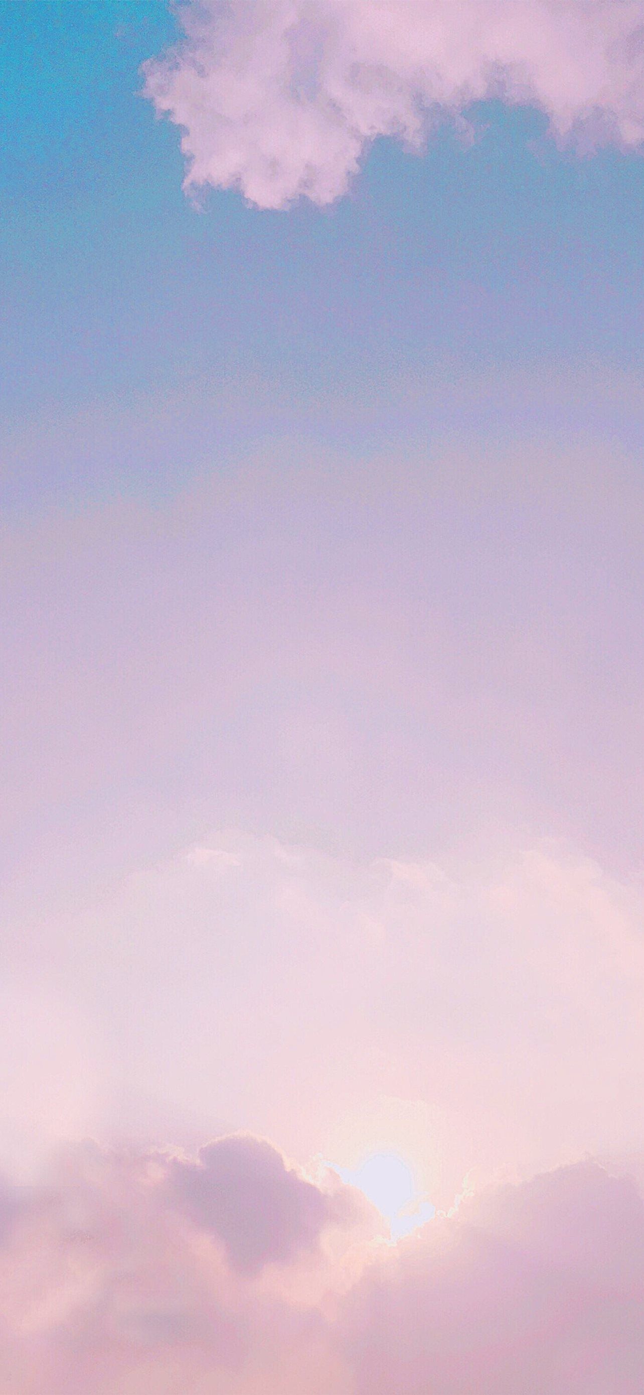 photo of pink and blue clouds iPhone 12 Wallpaper Free Download