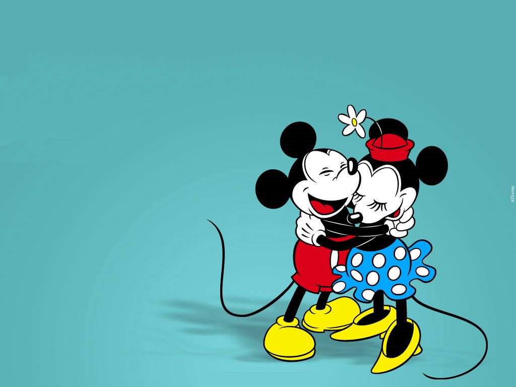 Mickey Mouse and Minnie Mouse hugging each other. - Minnie Mouse, Mickey Mouse