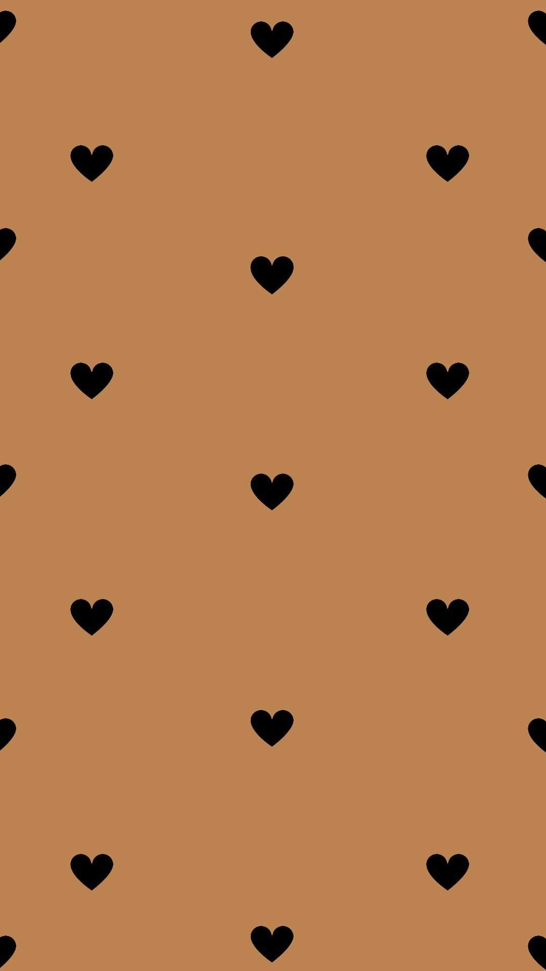 A brown background with black hearts - Heart