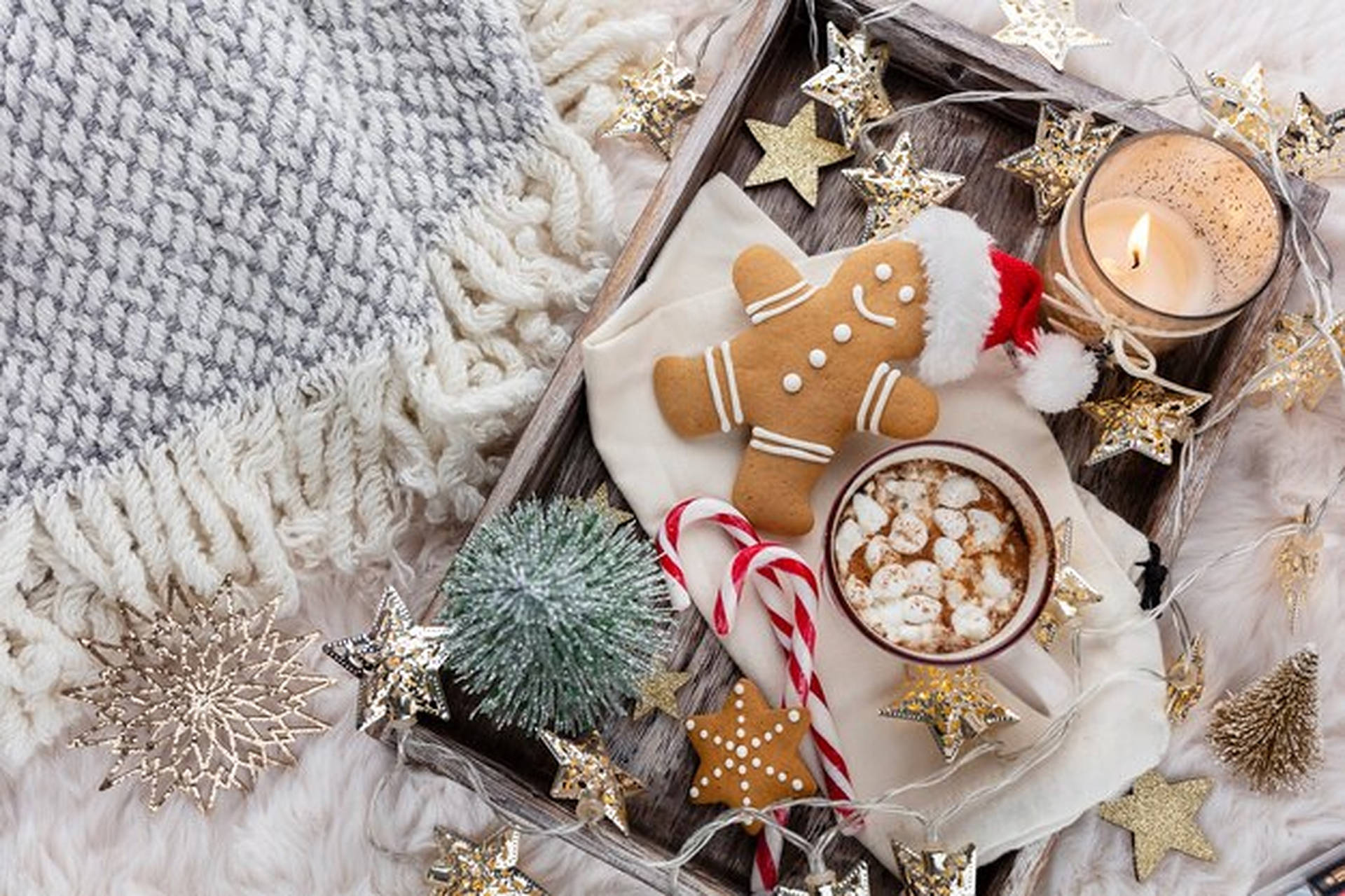 A tray with a hot chocolate, a gingerbread man and a candle. - Cozy, Christmas