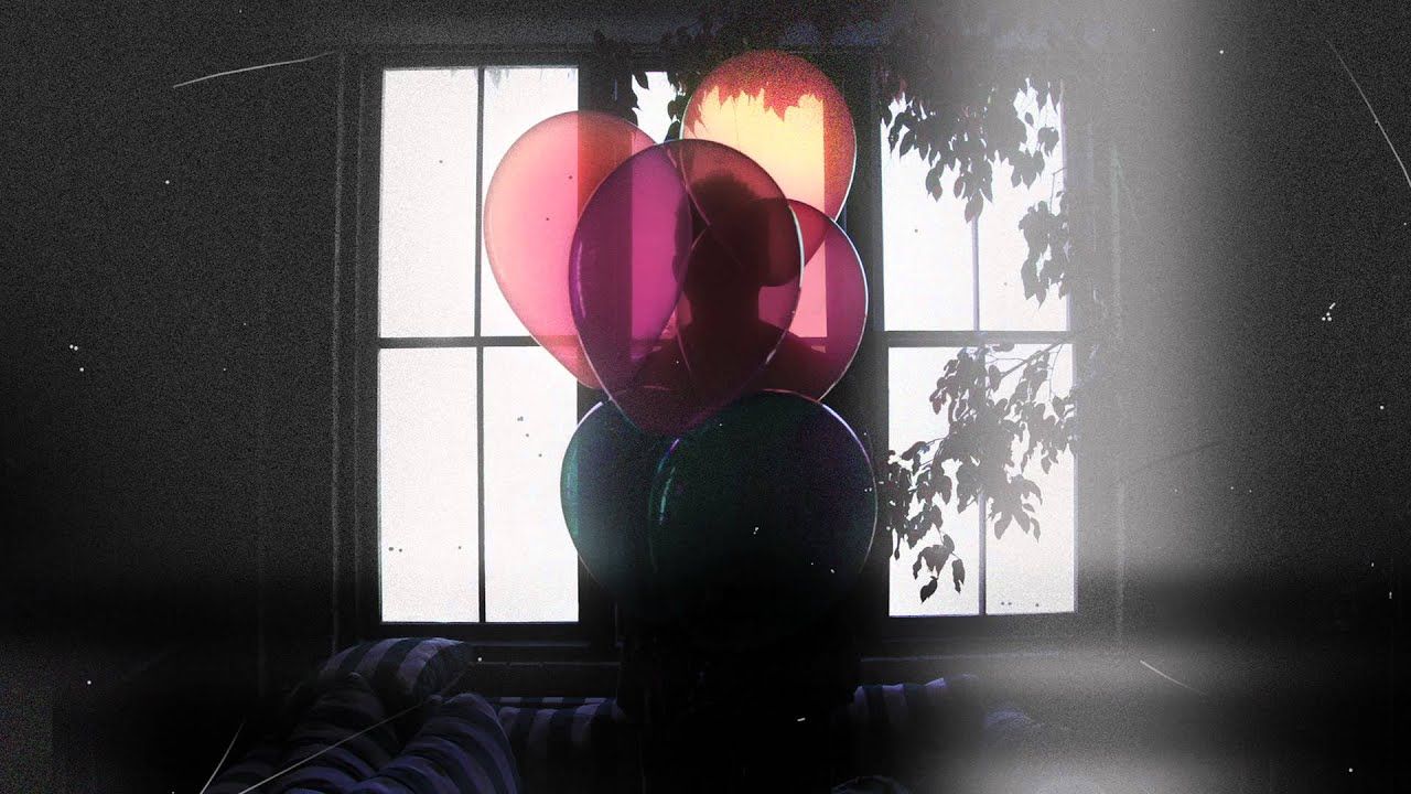 A person holding a bunch of balloons in front of a window. - The Weeknd
