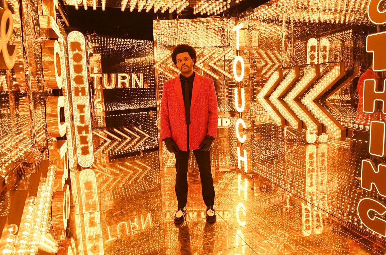 The Weeknd poses in a room of mirrors - The Weeknd
