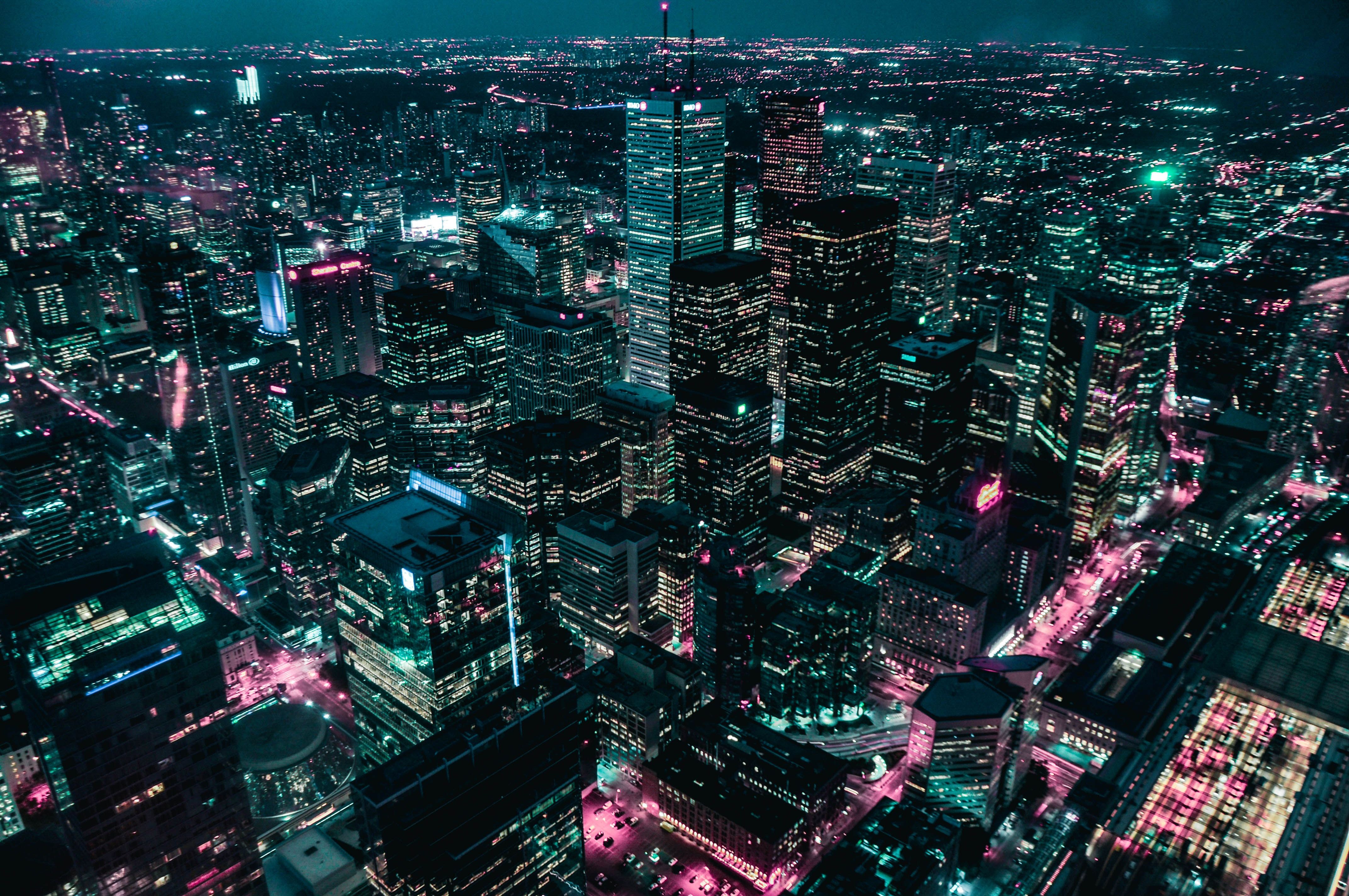 A city skyline at night with neon lights - City, anime city