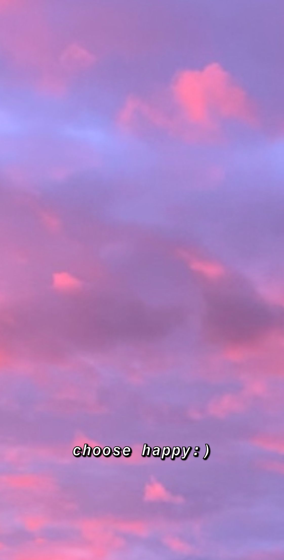 A pink and purple sky with clouds - Happy