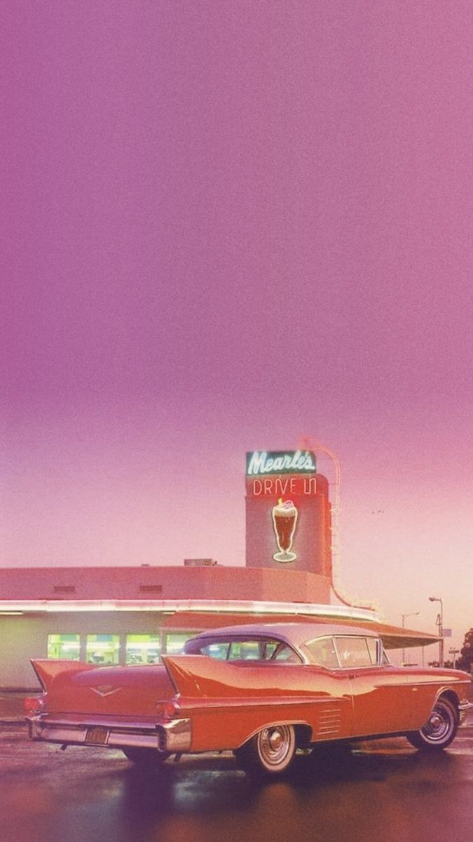 A red vintage car parked in front of a diner - 60s, cars, 50s, retro