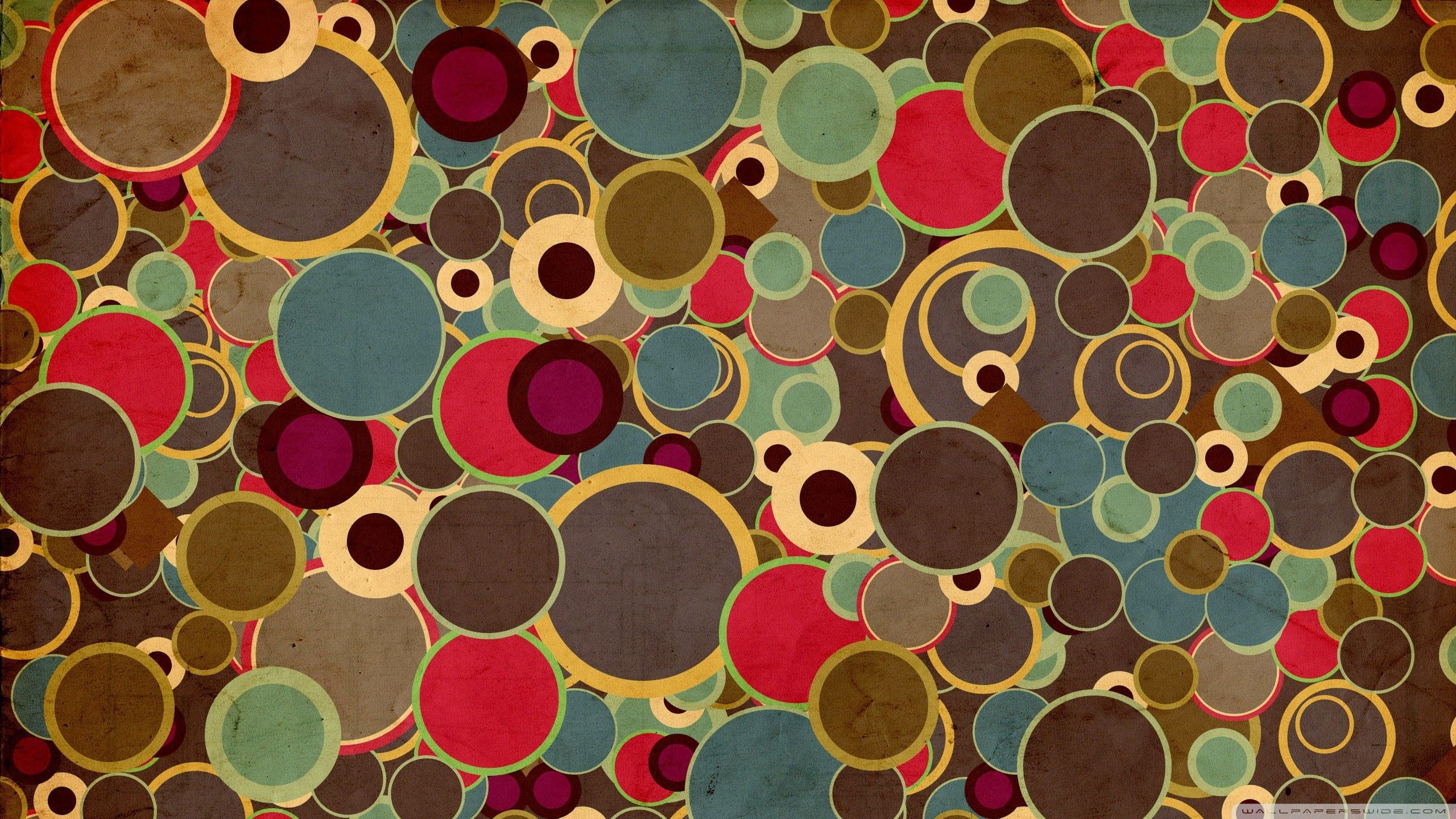 Colorful circles on a brown background wallpaper - 70s