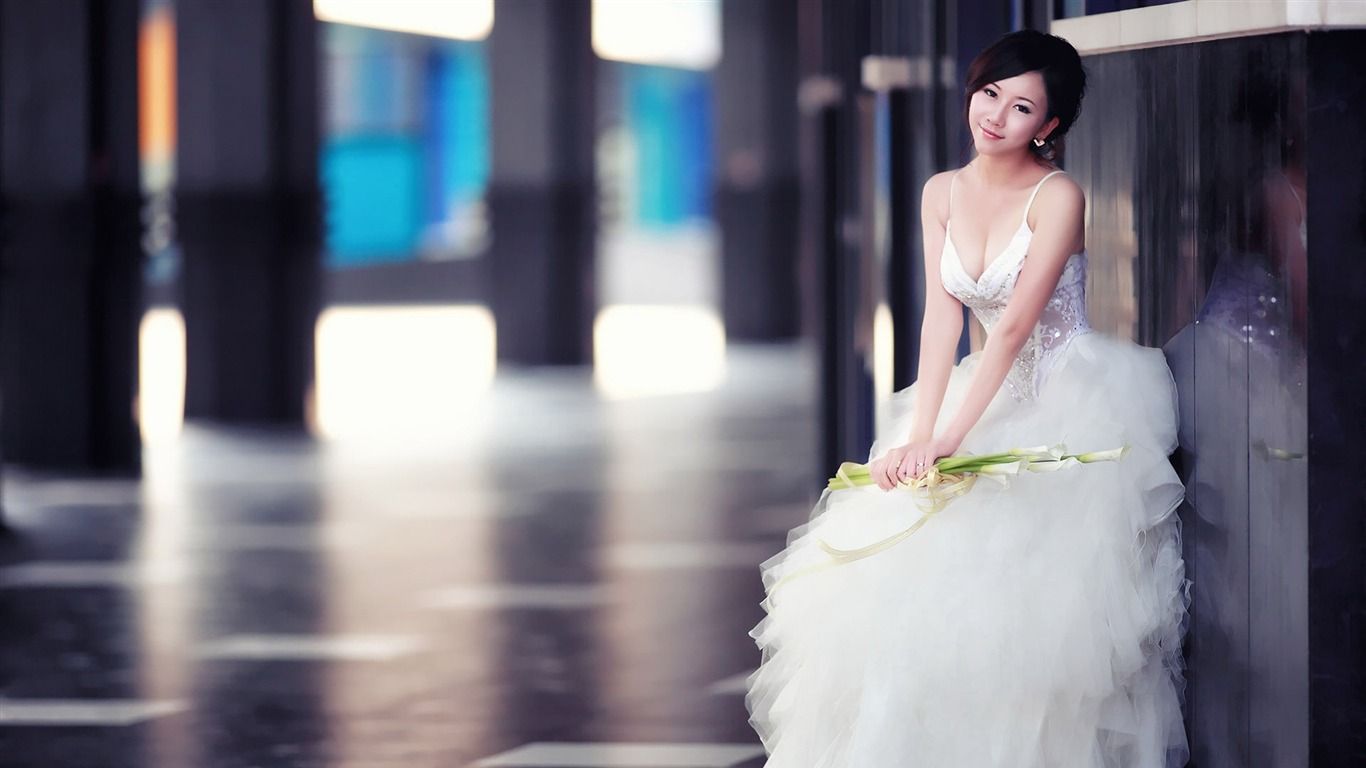 Asian bride in a white dress - Wedding