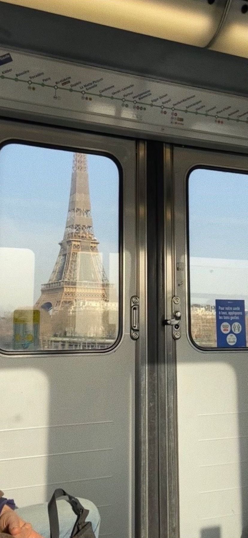 A view of the Eiffel Tower from a train. - Paris, France