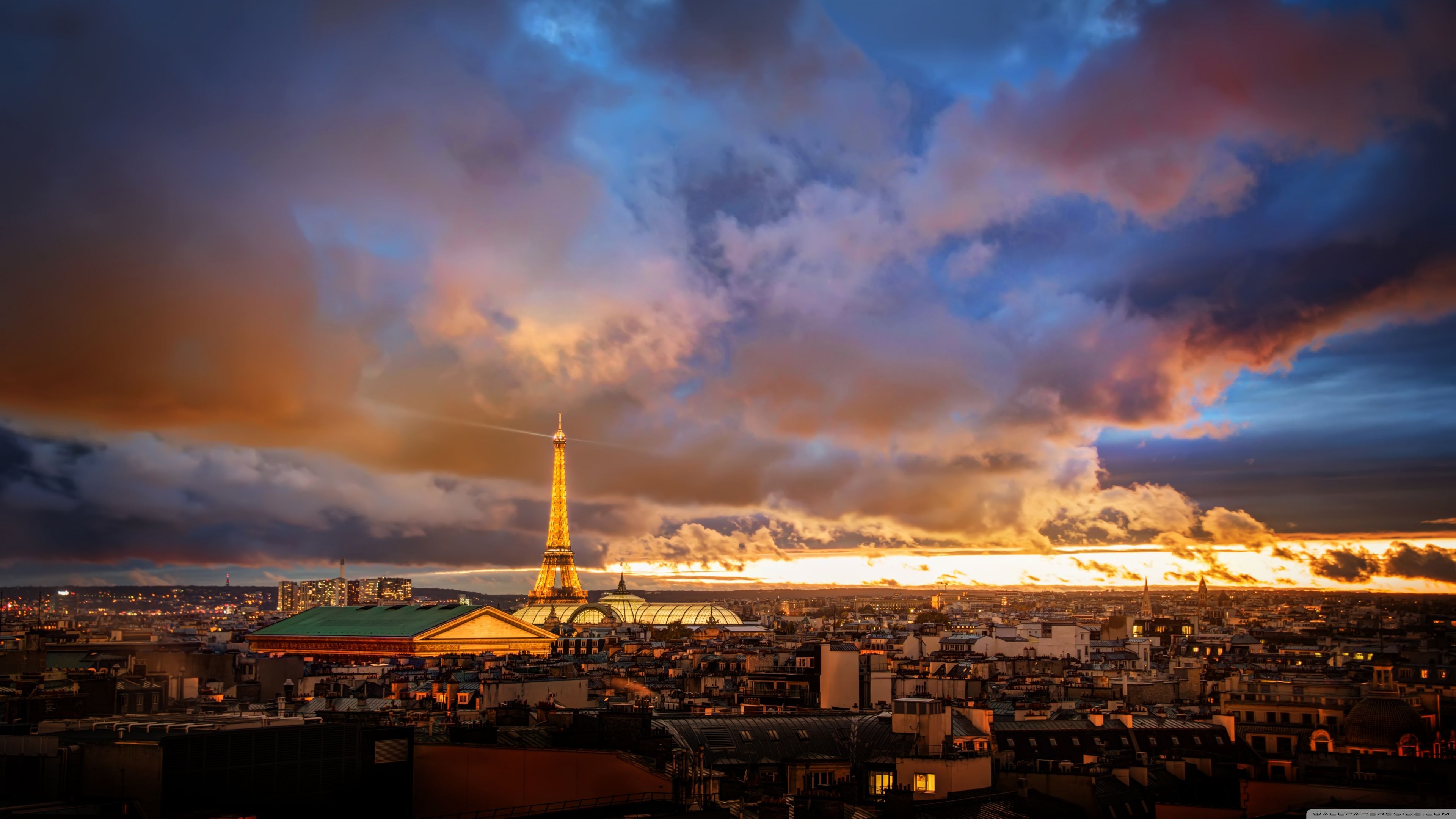 A city skyline with clouds and the eiffel tower - Paris