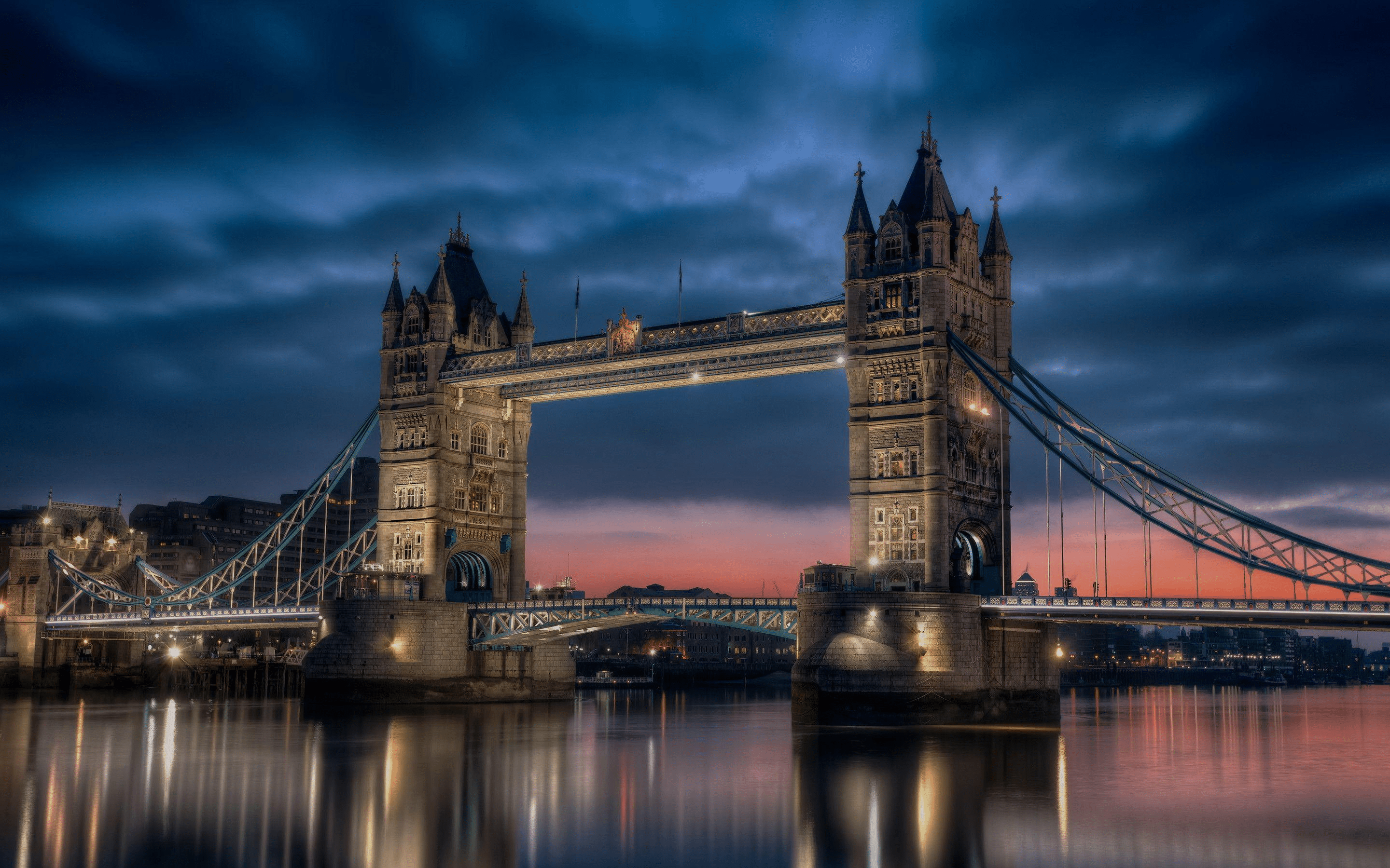 The Tower Bridge in London, England, is a suspension bridge that spans the River Thames. - London