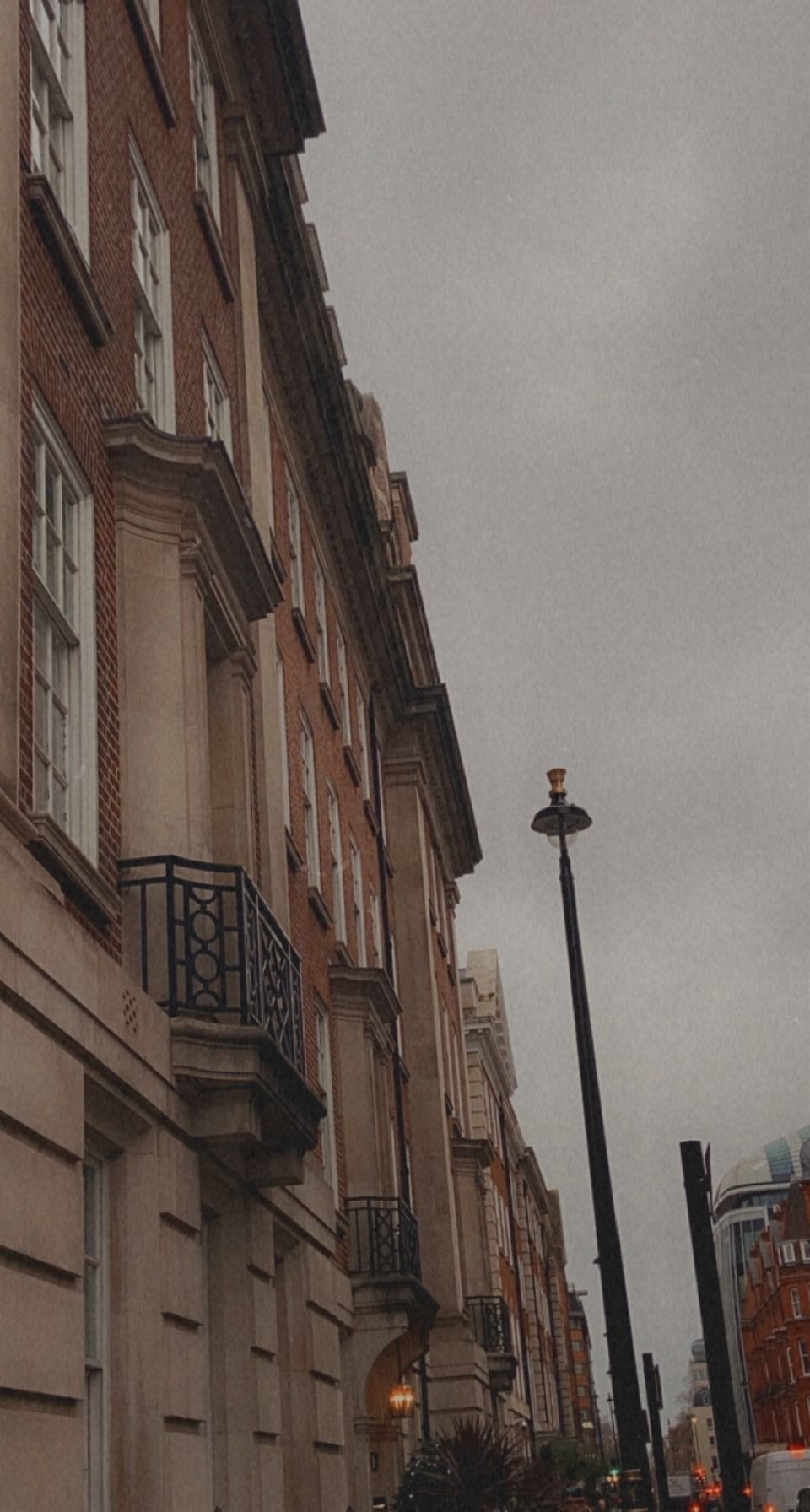 A street with cars and buildings on it - London