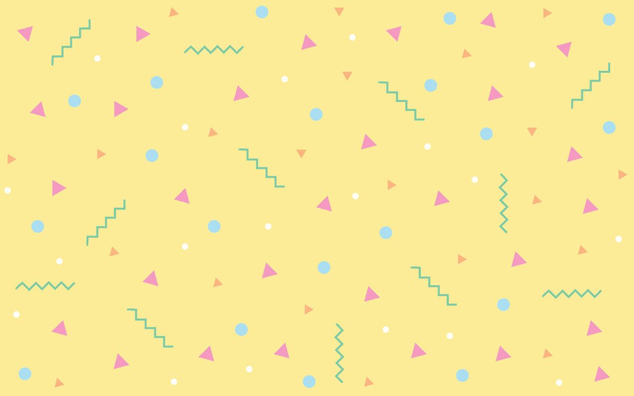 A yellow background with pink and blue triangles - 80s